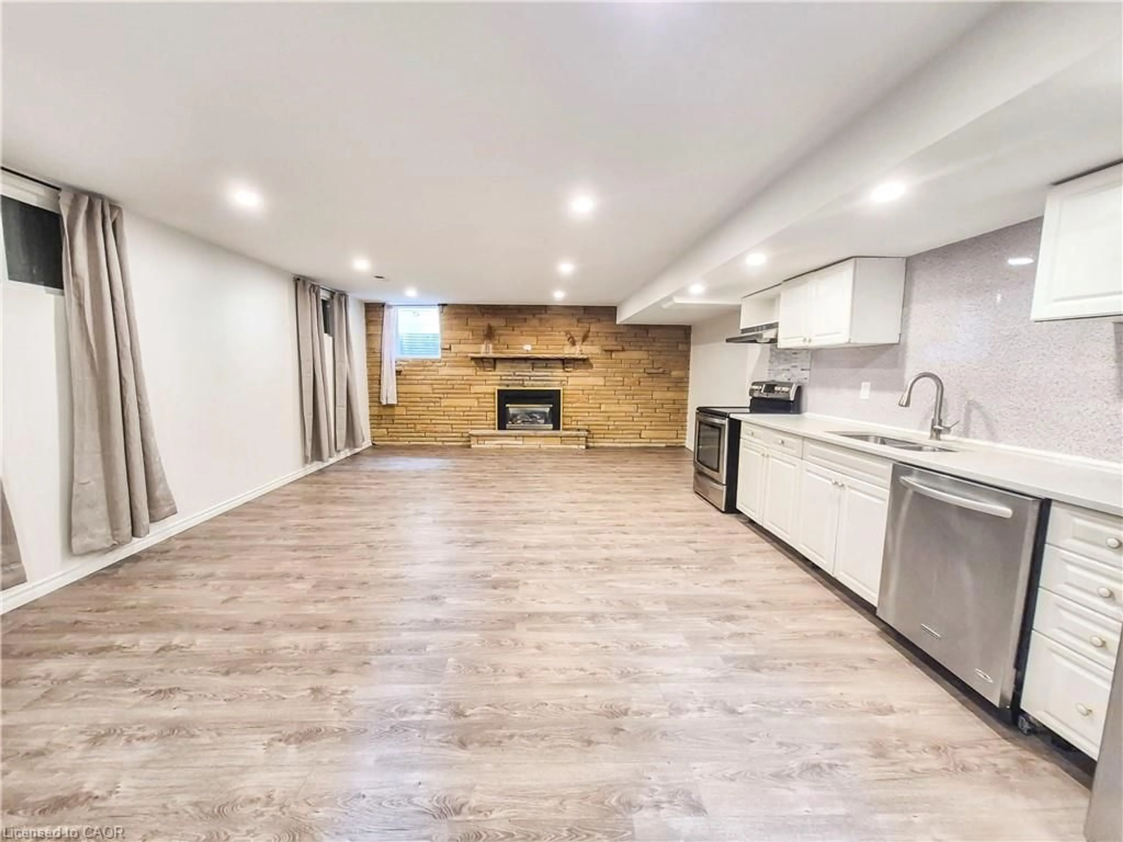 Open concept kitchen, wood/laminate floor for 11 Duncairn Ave, Kitchener Ontario N2M 4S5
