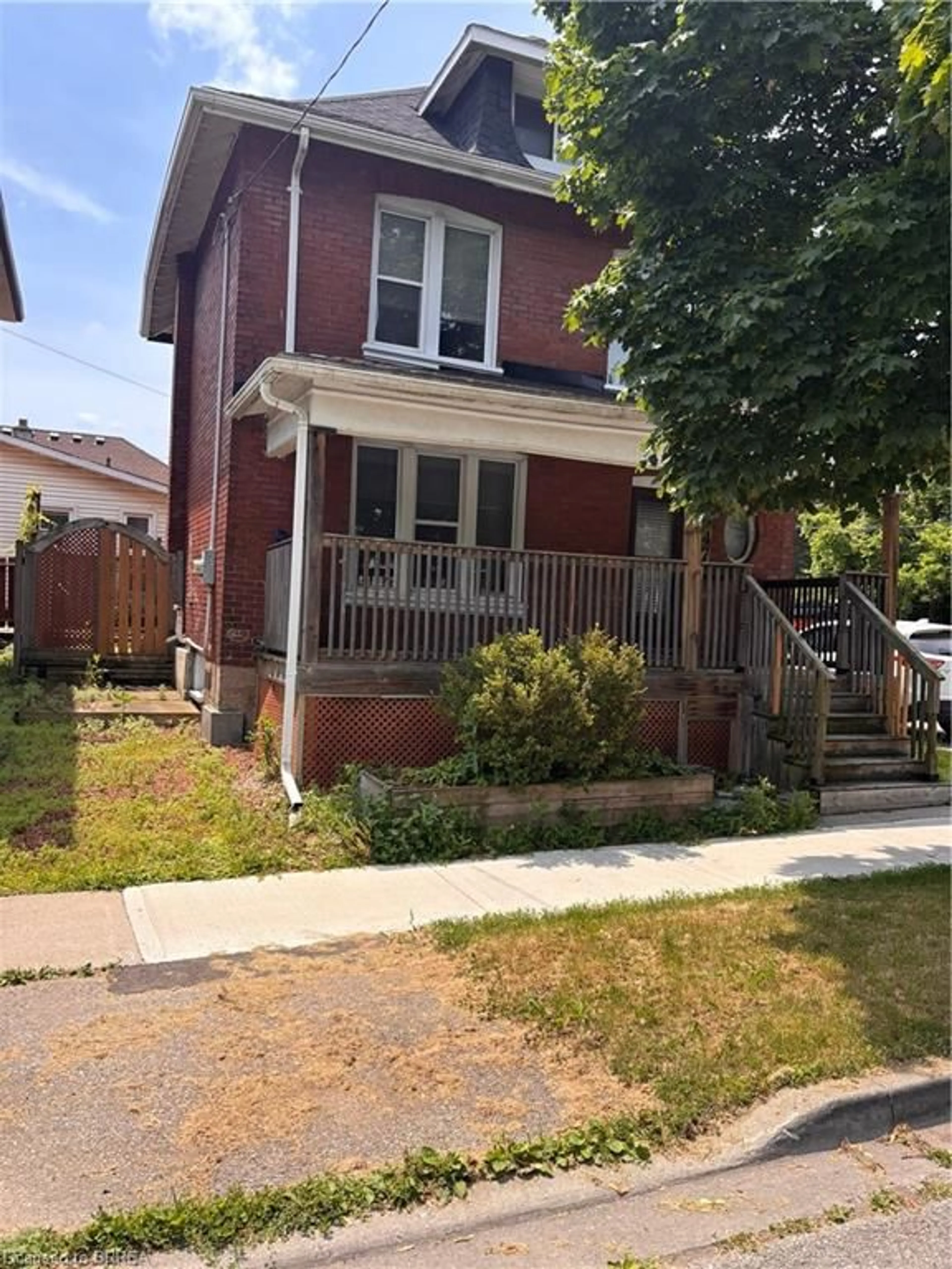 Home with brick exterior material, street for 47 Grey St, Brantford Ontario N3T 2T1
