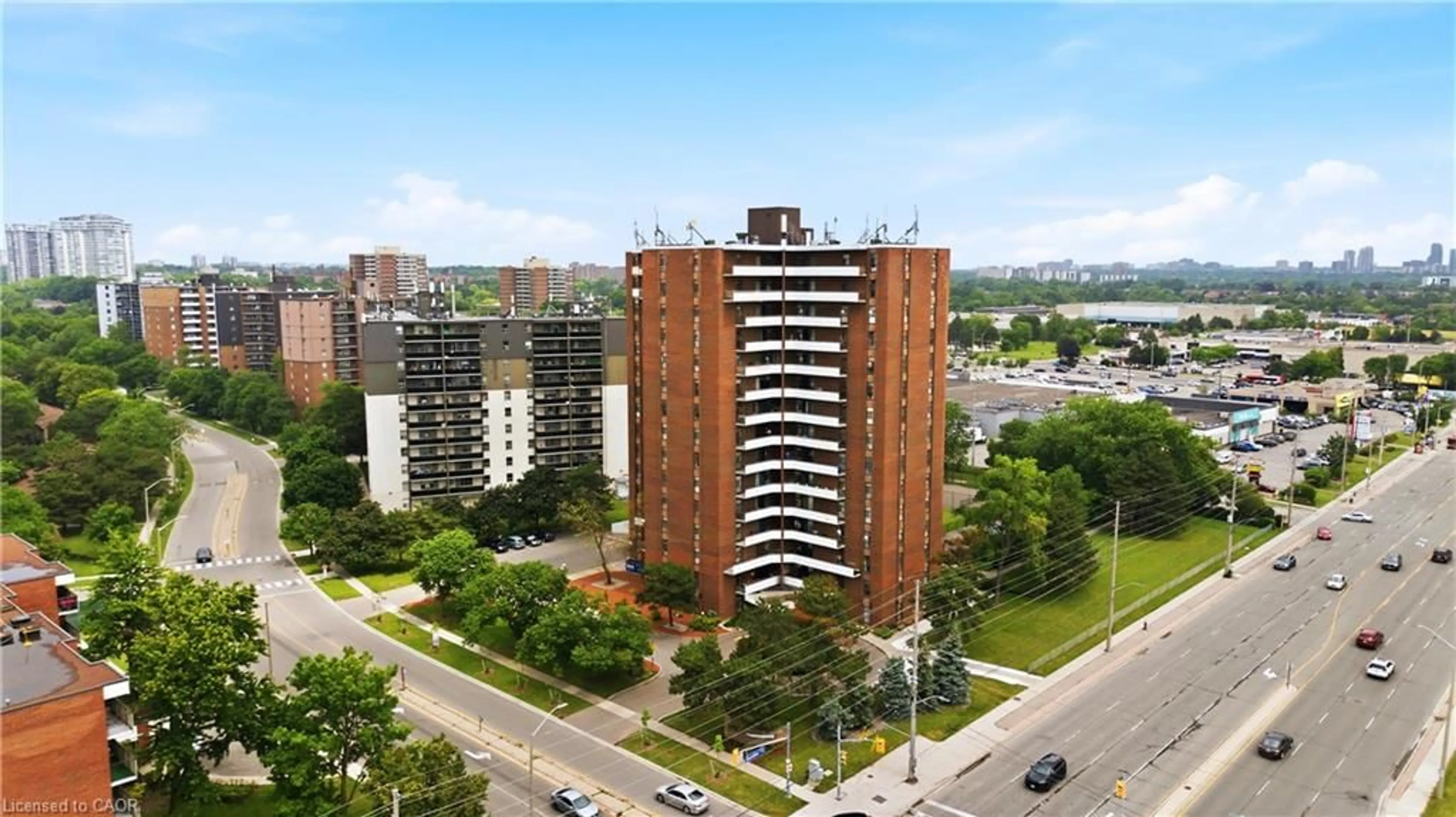 A pic from outside/outdoor area/front of a property/back of a property/a pic from drone, city buildings view from balcony for 3025 Queen Frederica Dr #201, Mississauga Ontario L4Y 3A1