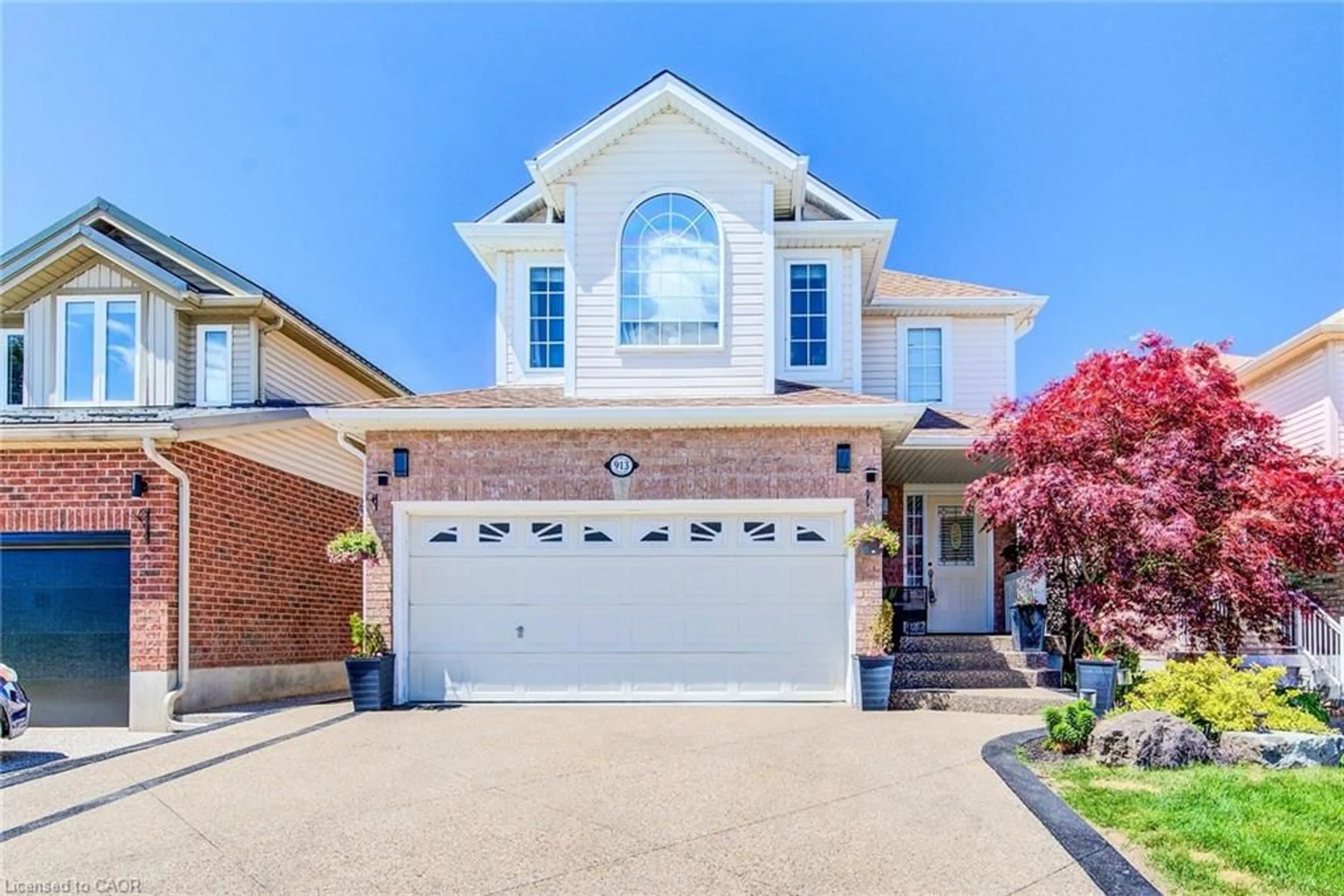 Home with brick exterior material, street for 913 Copper Leaf Cres, Kitchener Ontario N2E 3W1
