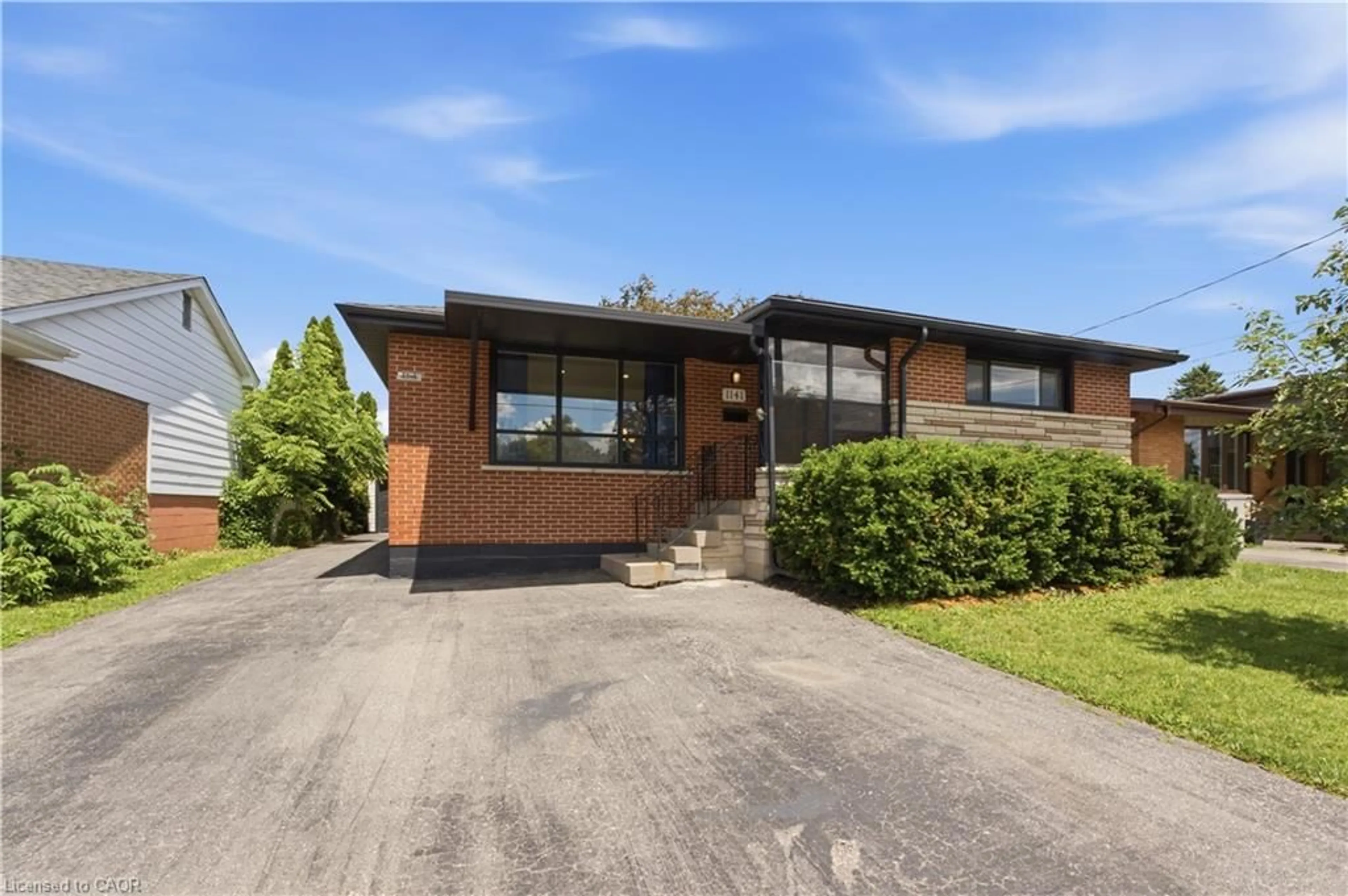 Home with brick exterior material, street for 1141 Mohawk Rd, Hamilton Ontario L8T 2S4