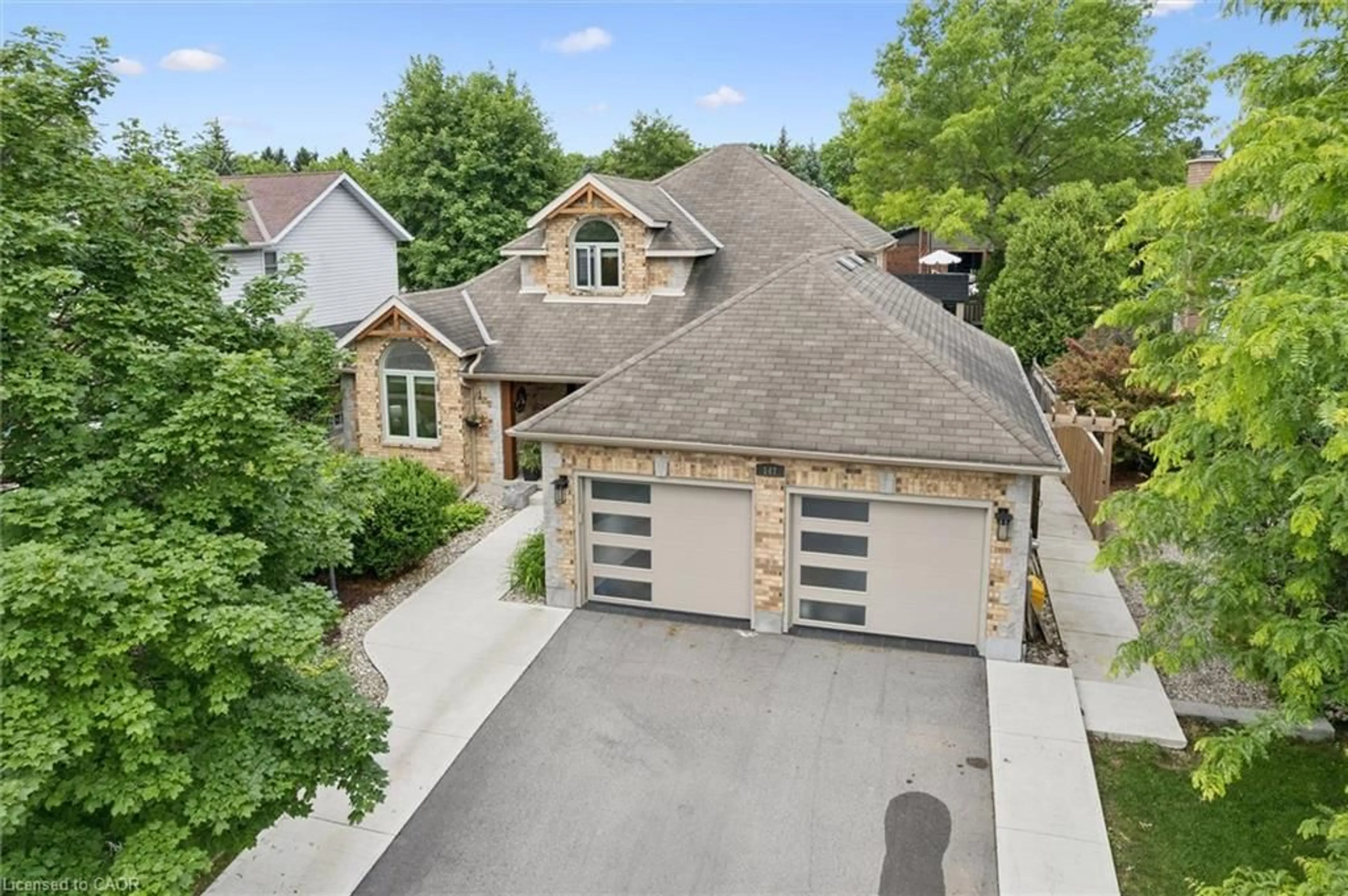 A pic from outside/outdoor area/front of a property/back of a property/a pic from drone, street for 147 Downey Rd, Guelph Ontario N1C 1A3