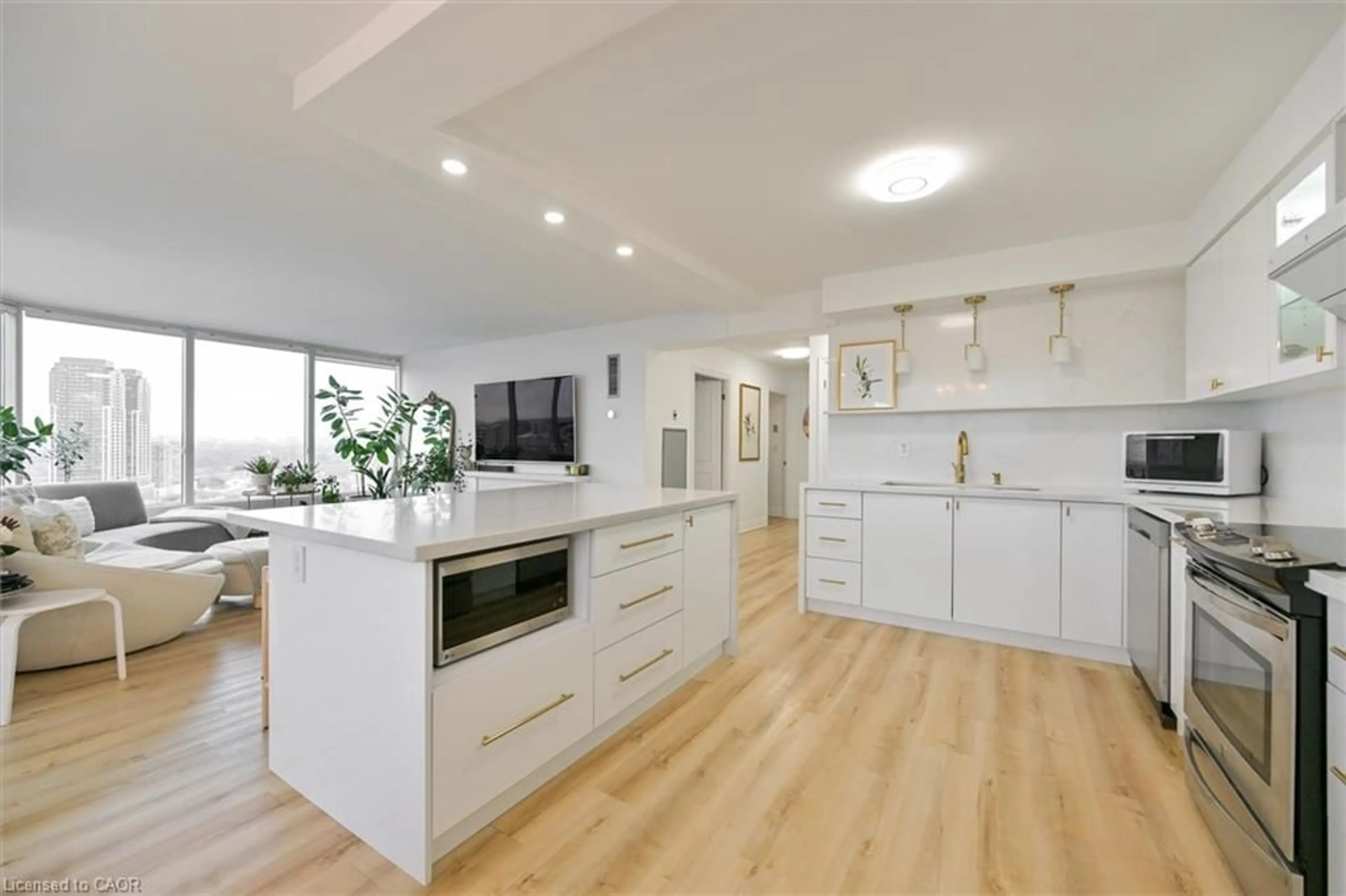 Open concept kitchen, wood/laminate floor for 1 Palace Pier Crt #2210, Etobicoke Ontario M8V 3W9