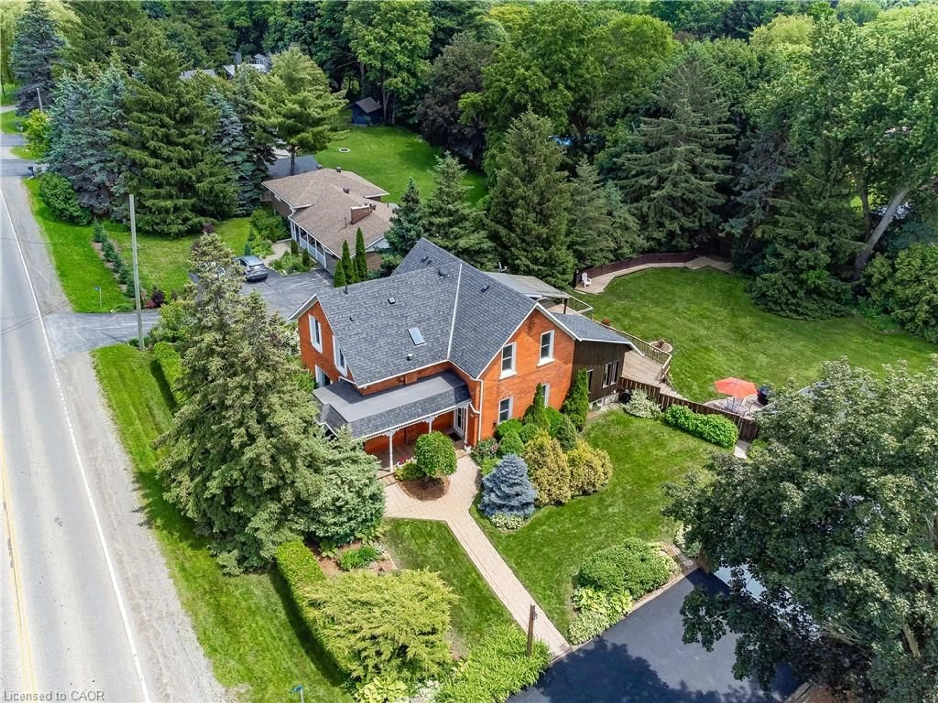A pic from outside/outdoor area/front of a property/back of a property/a pic from drone, street for 117 Hwy 8, Greensville Ontario L9H 4V7