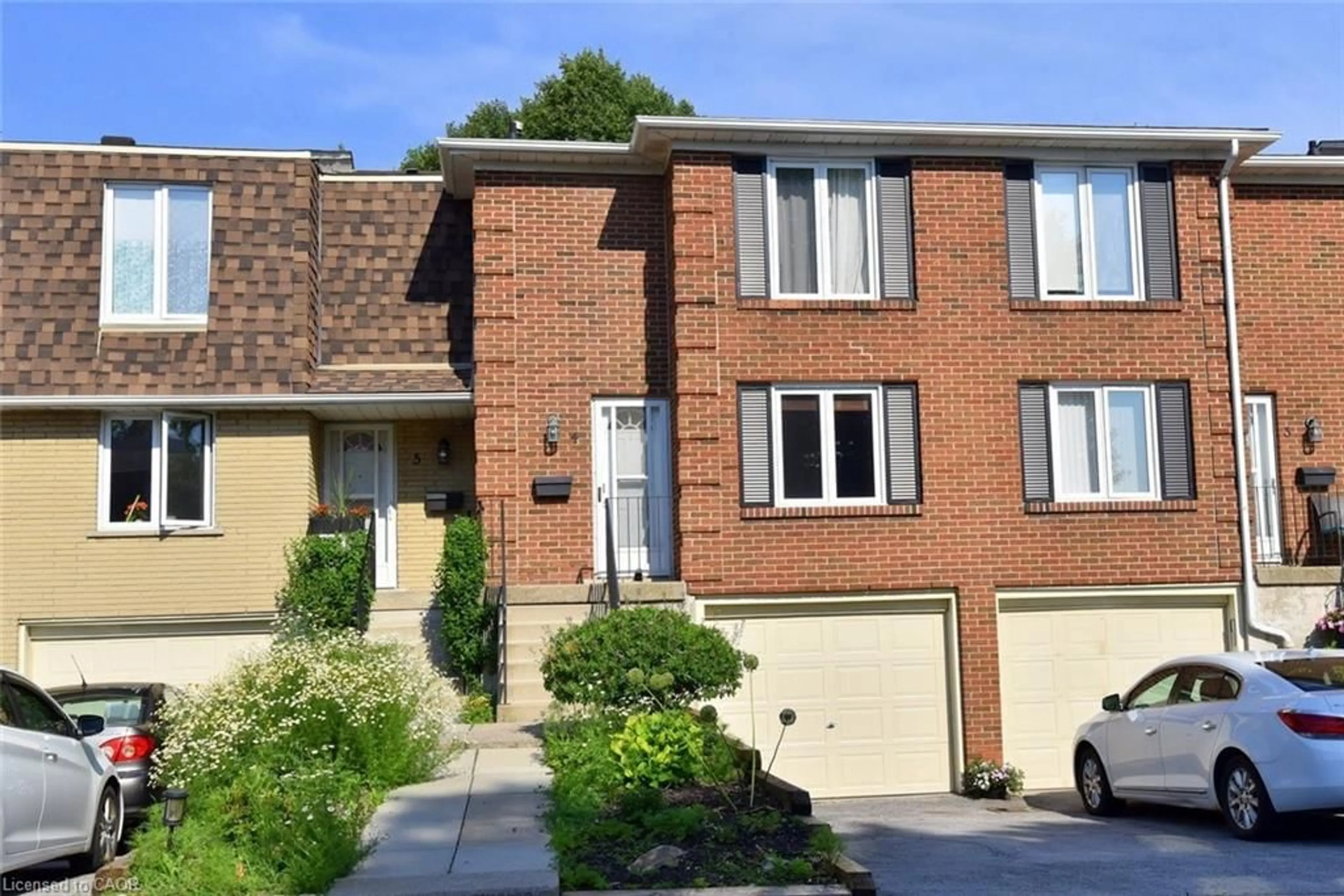 Home with brick exterior material, street for 299 Limeridge Rd #4, Hamilton Ontario L9C 2V4