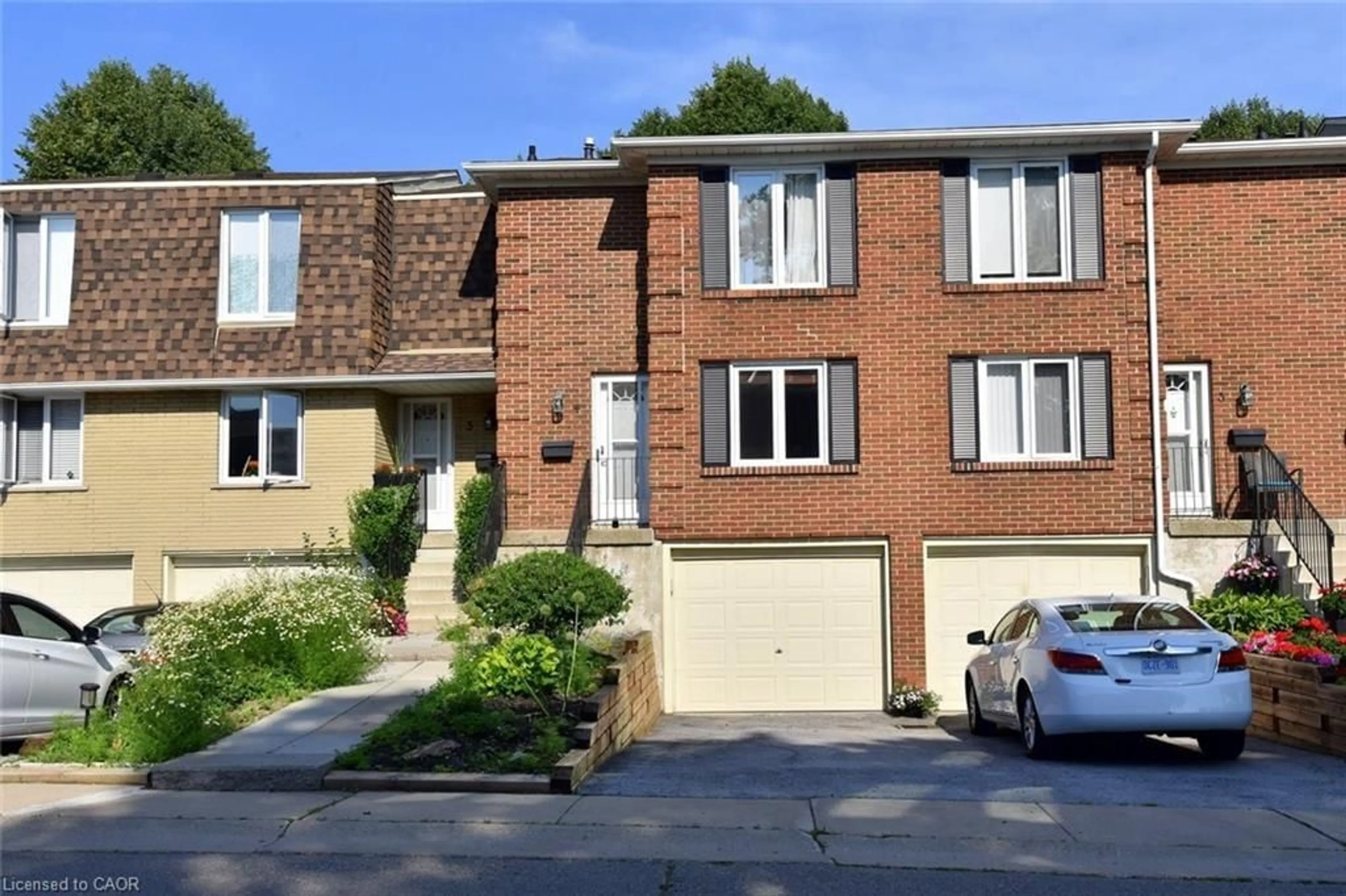 Home with brick exterior material, street for 299 Limeridge Rd #4, Hamilton Ontario L9C 2V4
