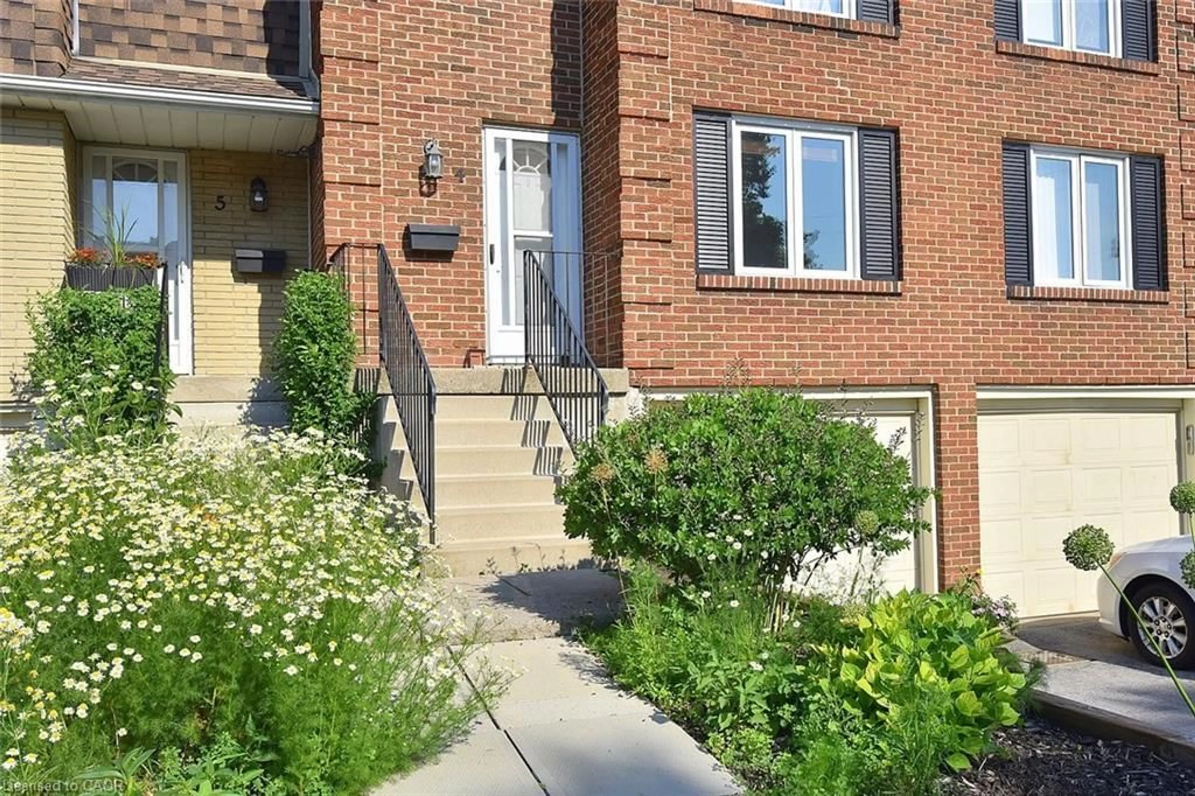 Home with brick exterior material, street for 299 Limeridge Rd #4, Hamilton Ontario L9C 2V4