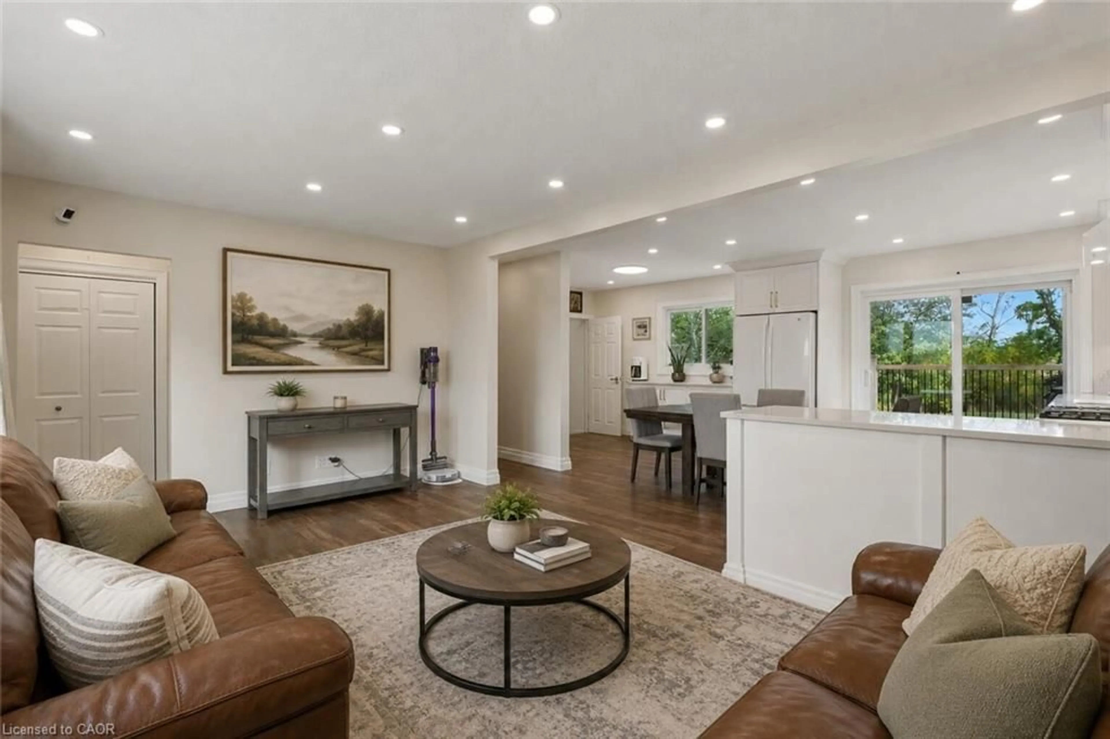 Living room with furniture, ceramic/tile floor for 293 #20 Regional Rd, Stoney Creek Ontario L8J 3H4