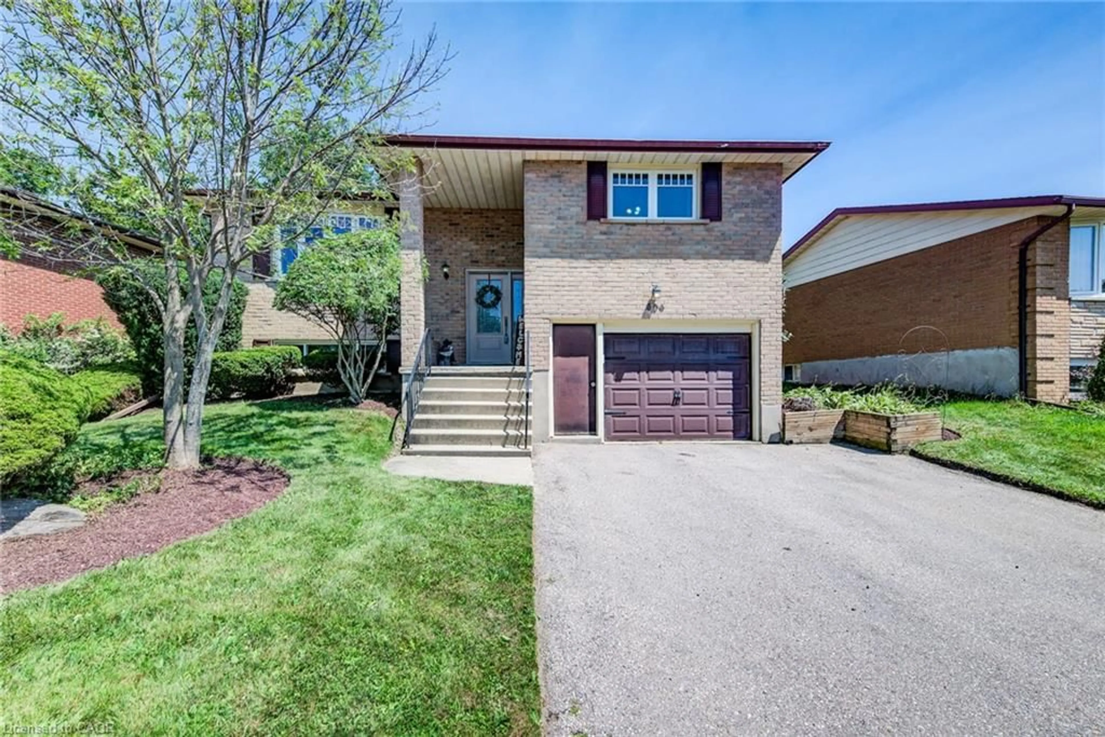 Home with brick exterior material, street for 606 Fern Rd, Waterloo Ontario N2V 1G5