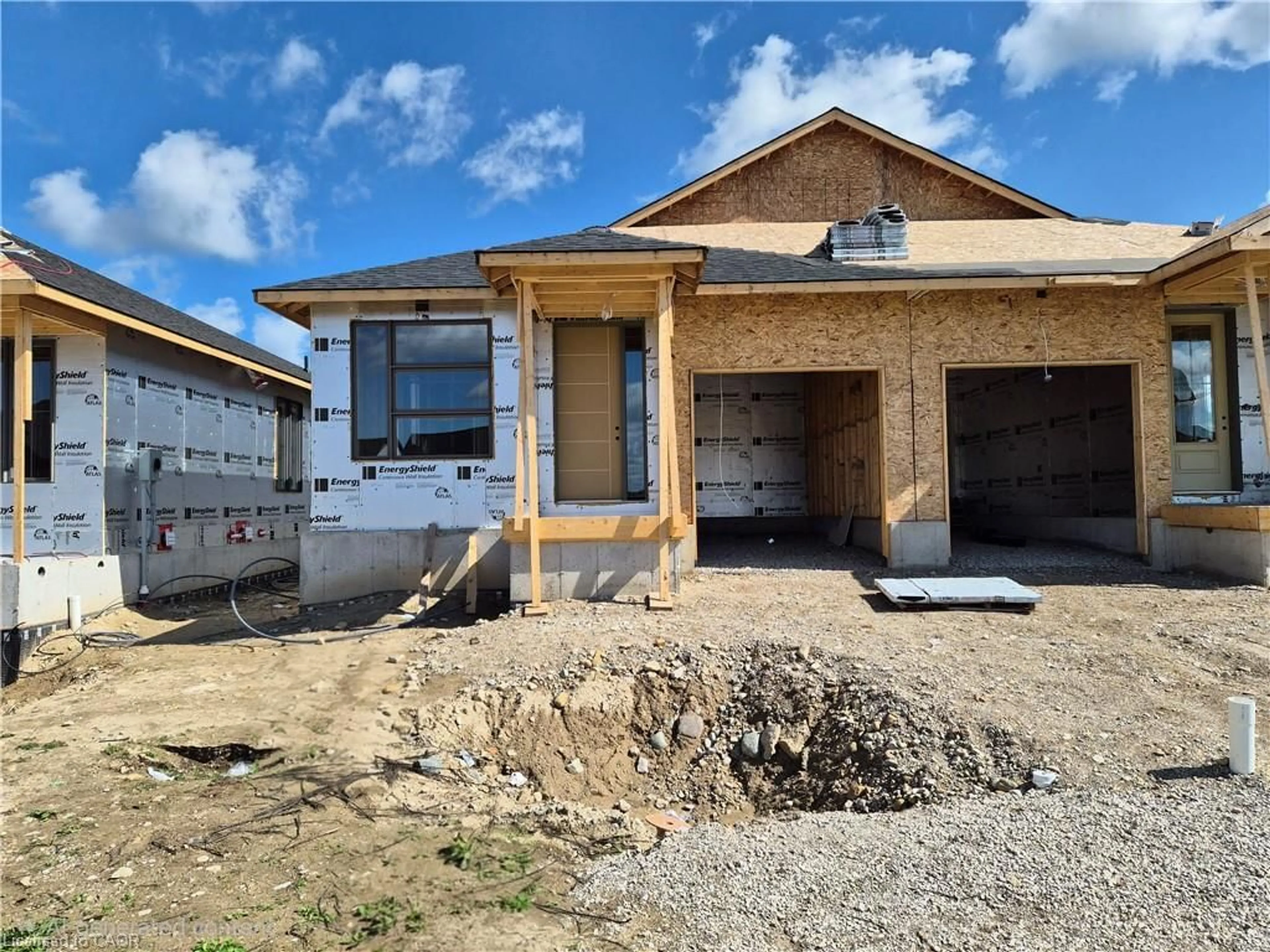 Home with brick exterior material, building for 112 Thackeray Way, Harriston Ontario N0G 1Z0