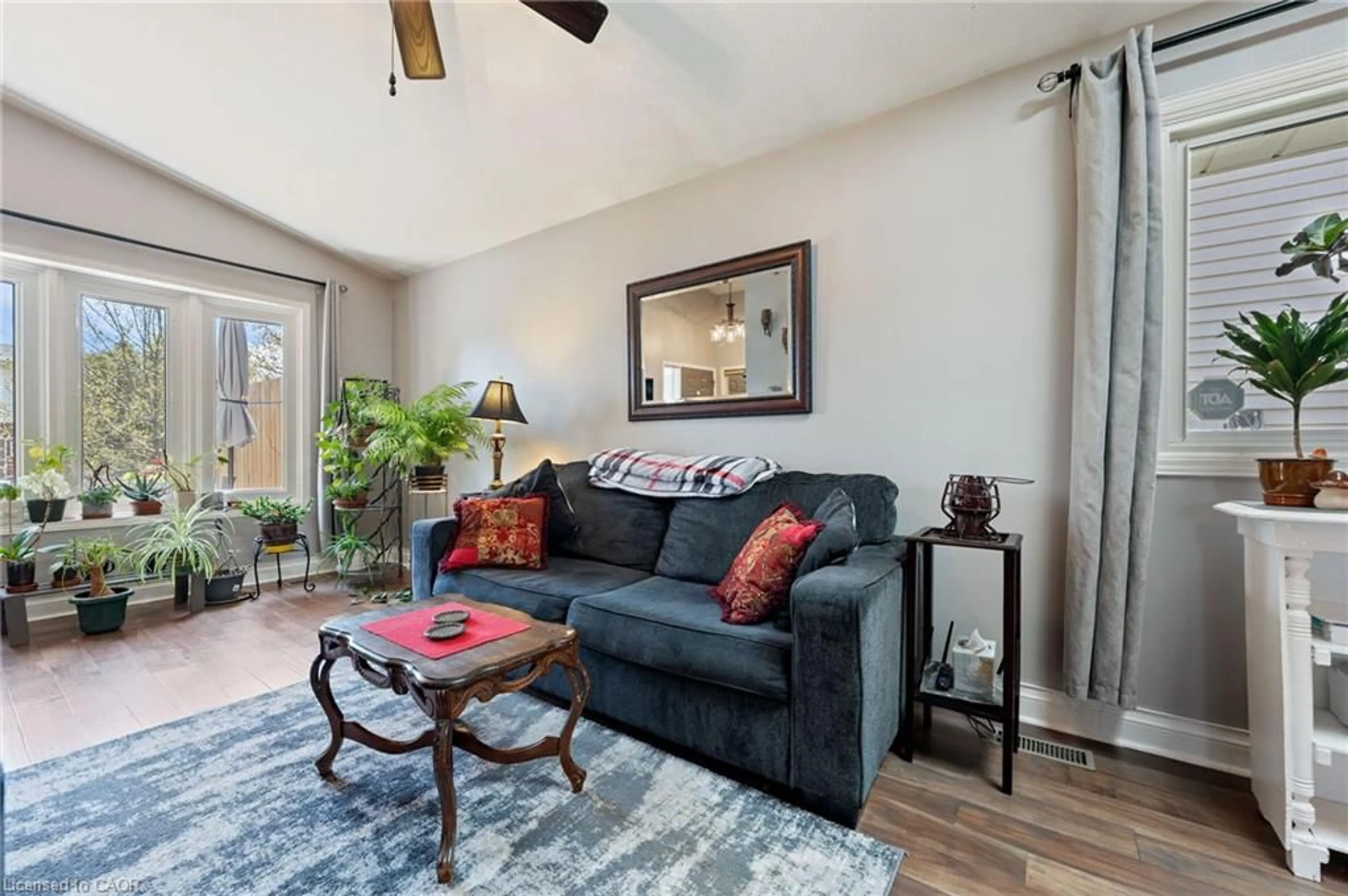 Living room with furniture, wood/laminate floor for 2 Hampton Crt, Port Dover Ontario N0A 1N4