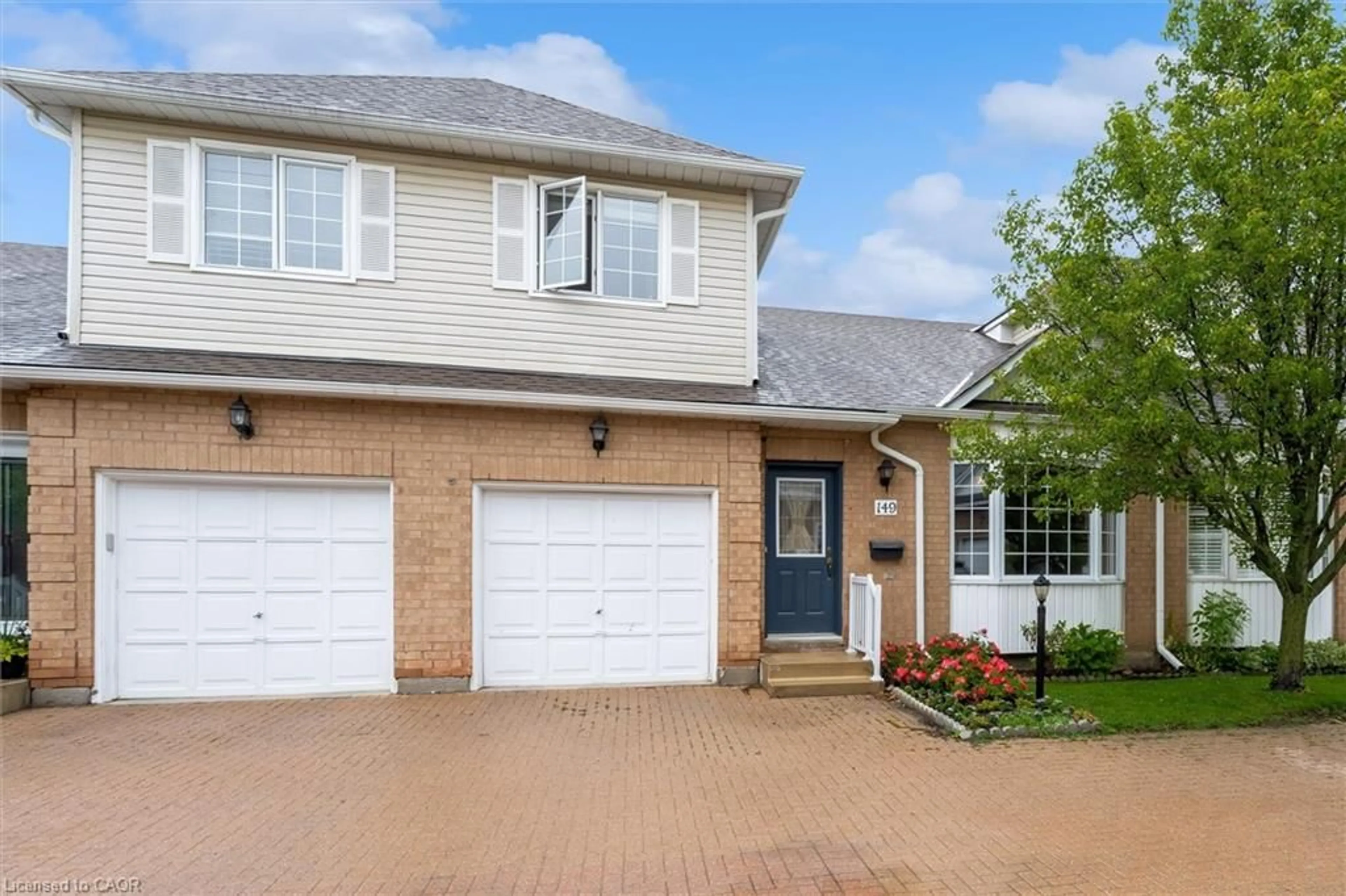 Home with brick exterior material, street for 149 Silverbirch Blvd, Hamilton Ontario L0R 1W0