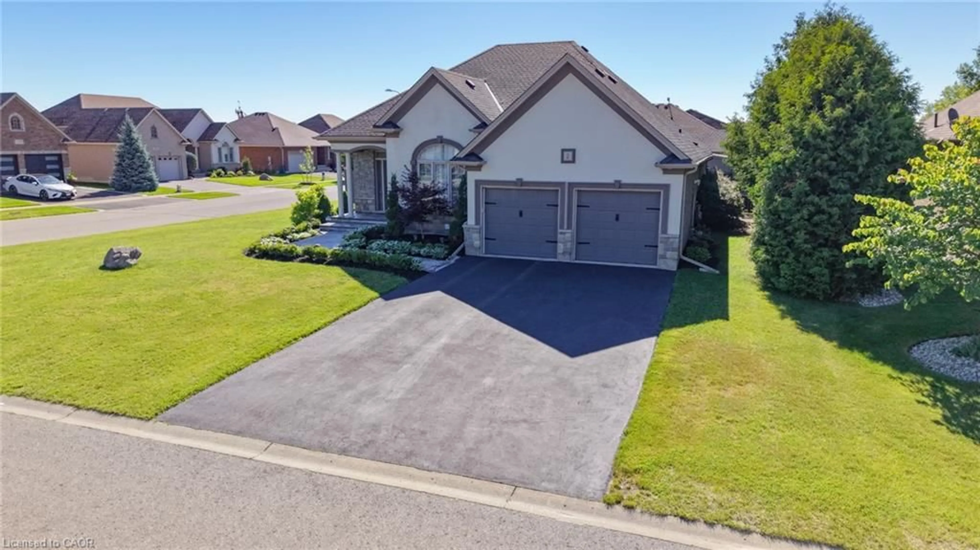 A pic from outside/outdoor area/front of a property/back of a property/a pic from drone, street for 2 Kim Lane, Waterford Ontario N0E 1Y0
