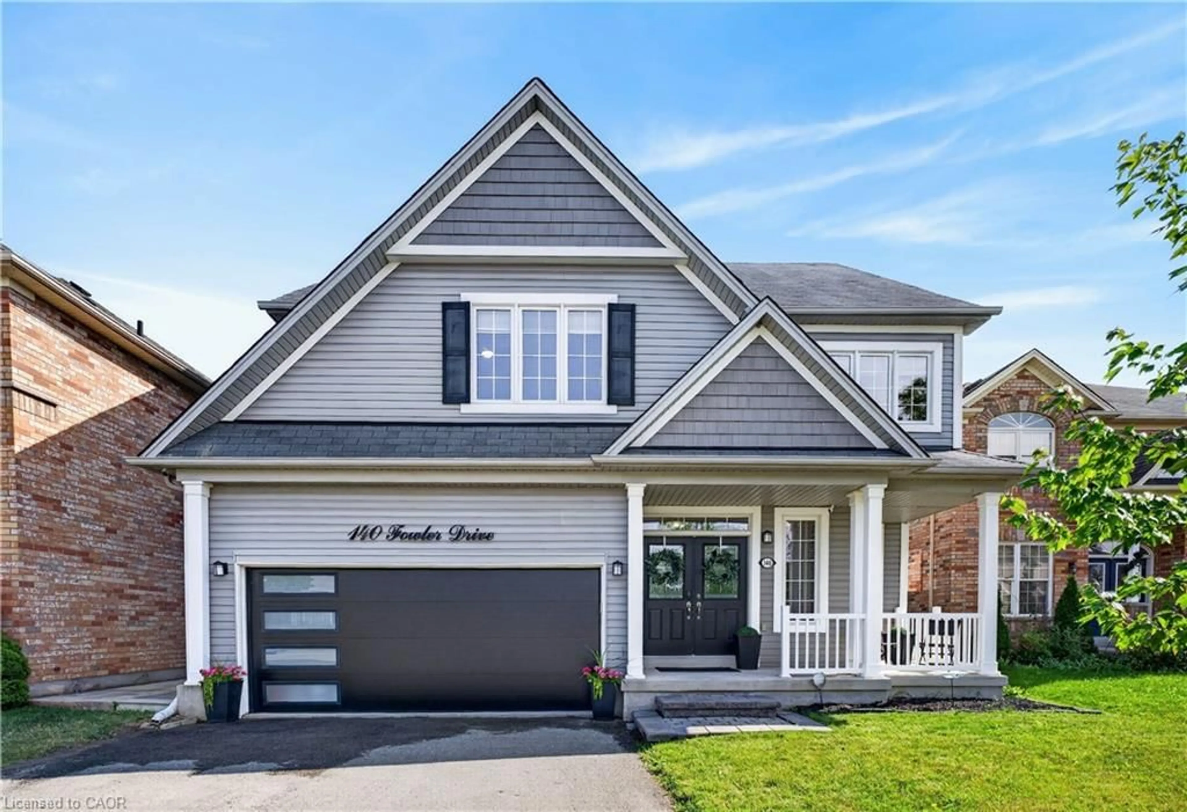 Home with vinyl exterior material, street for 140 Fowler Dr, Binbrook Ontario L0R 1C0