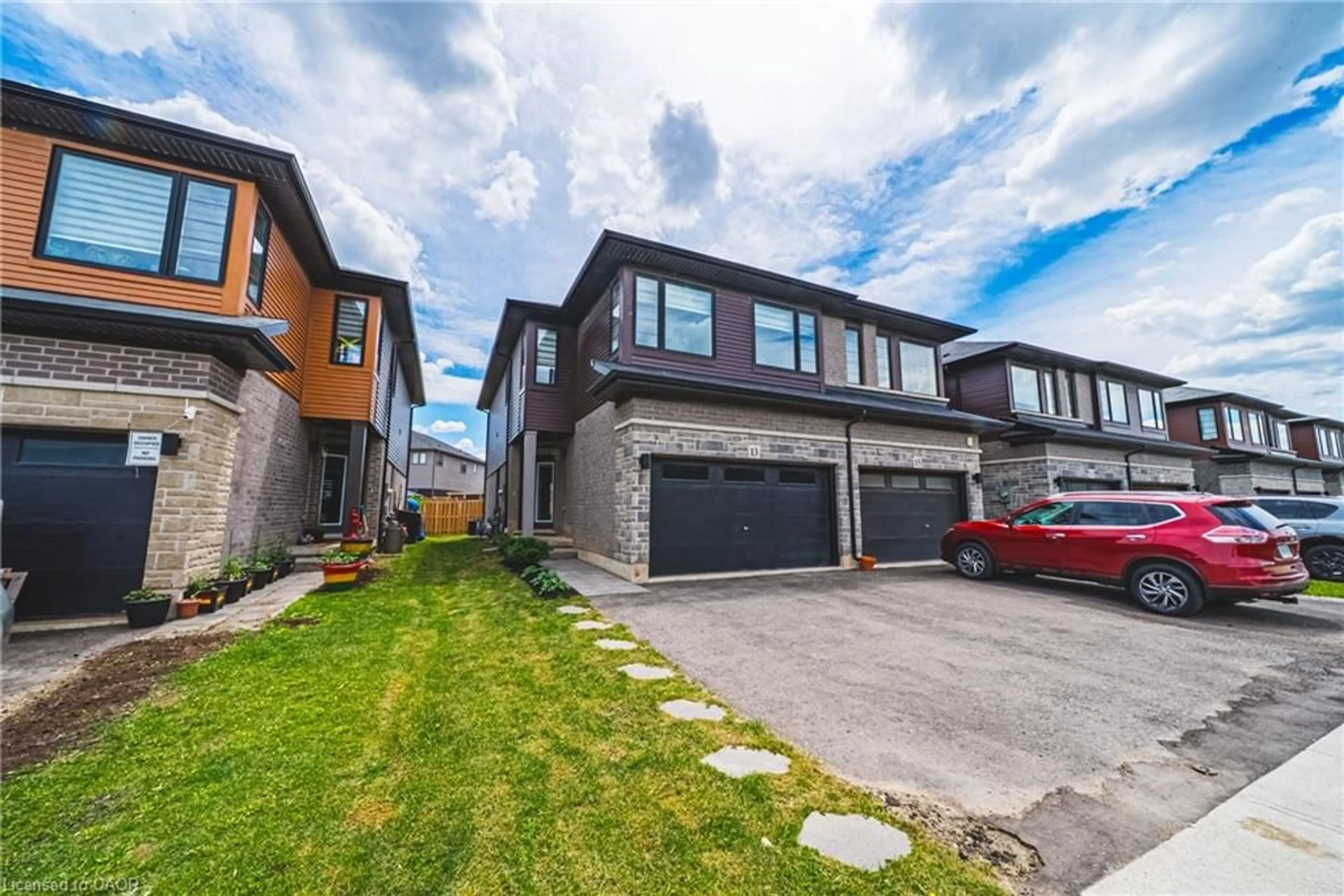 A pic from outside/outdoor area/front of a property/back of a property/a pic from drone, street for 13 Bellhouse Ave, Brantford Ontario N3T 0T9