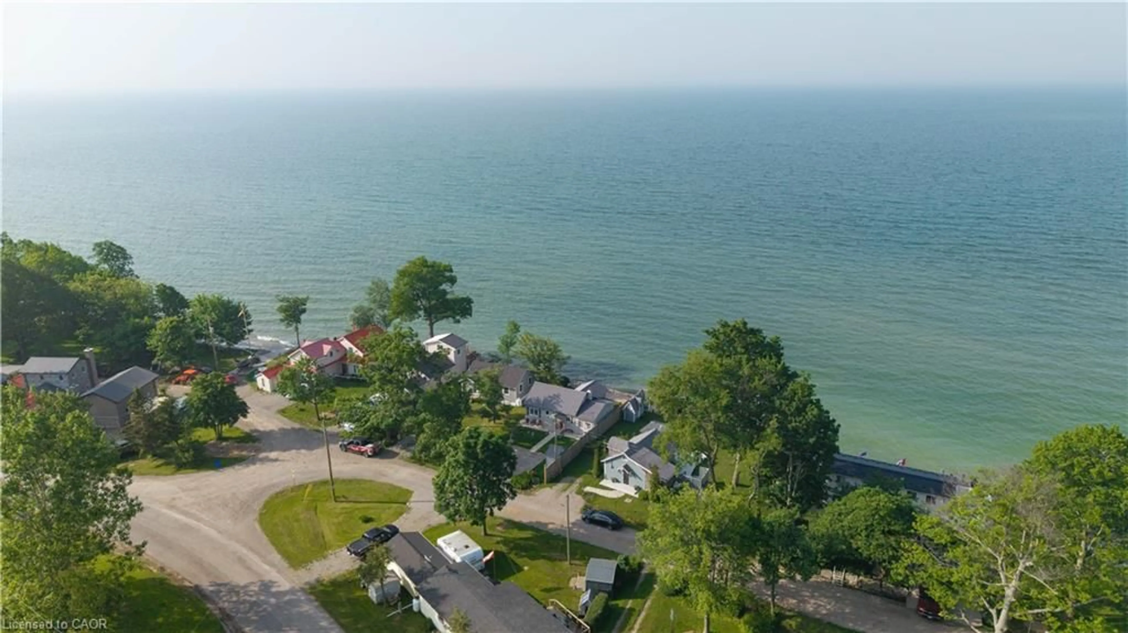 A pic from outside/outdoor area/front of a property/back of a property/a pic from drone, water/lake/river/ocean view for 7 Shoreline Trail, Dunnville Ontario N1A 2W8