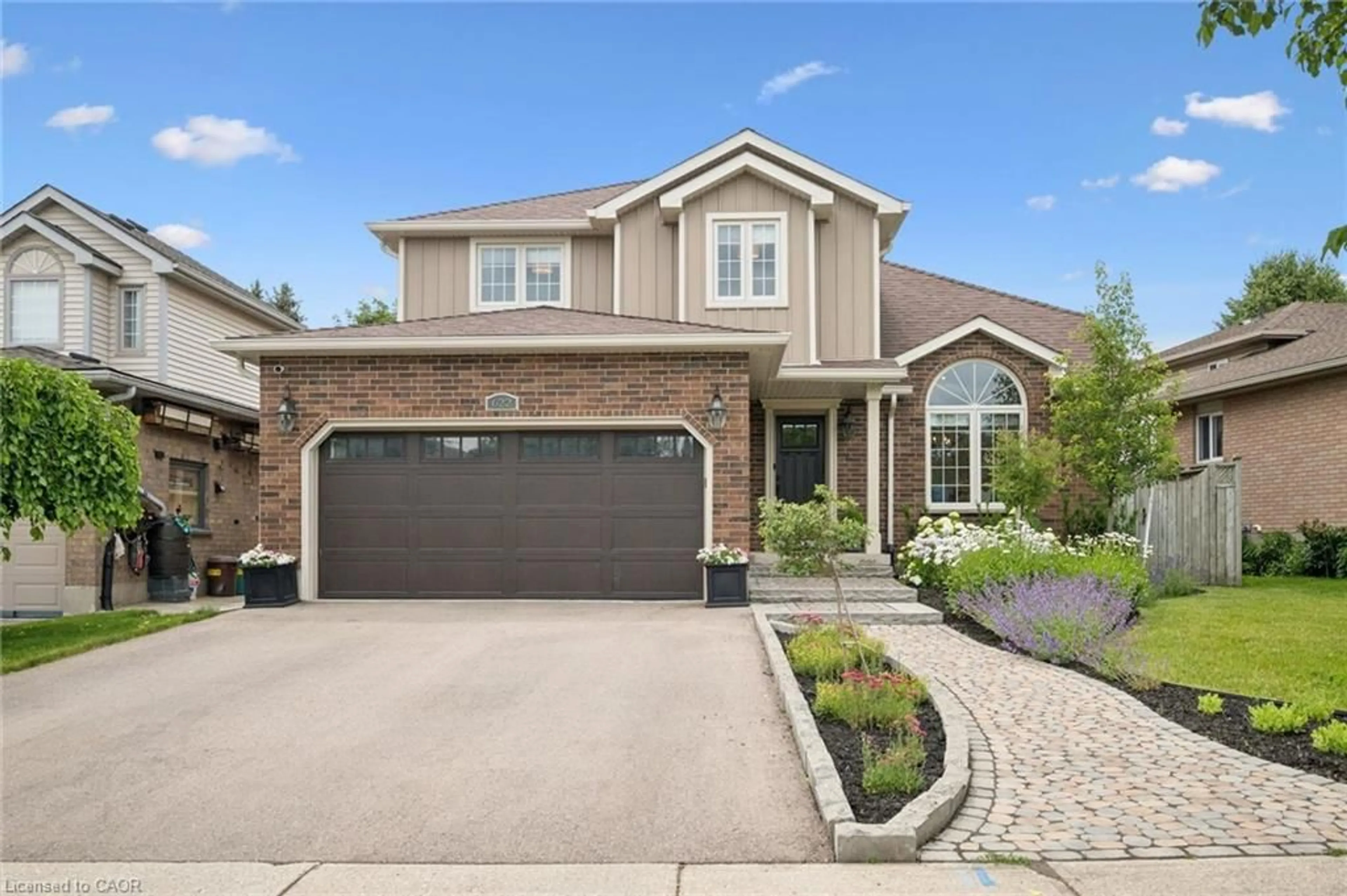 Home with brick exterior material, street for 622 Westfield Dr, Waterloo Ontario N2T 2P2