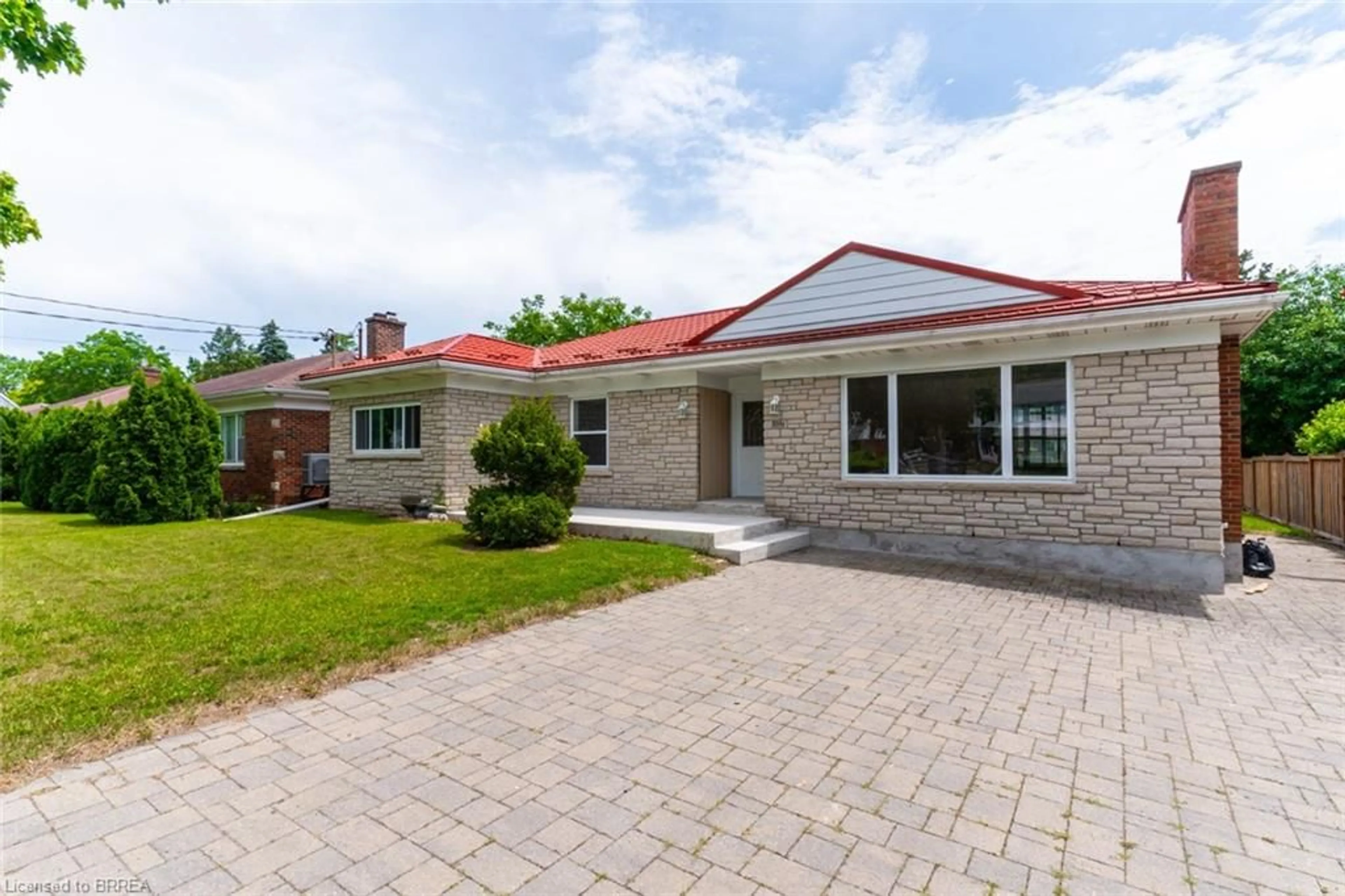 Home with brick exterior material, street for 107 Queensway Dr, Brantford Ontario N3R 4X1