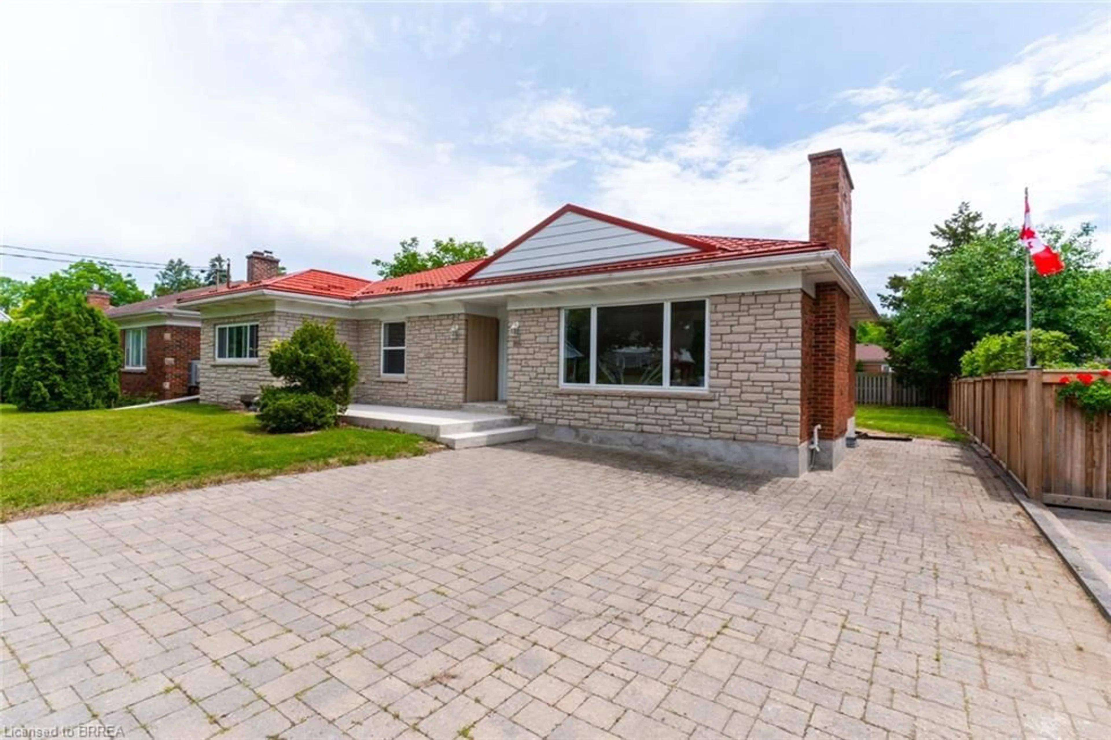 Home with brick exterior material, street for 107 Queensway Dr, Brantford Ontario N3R 4X1