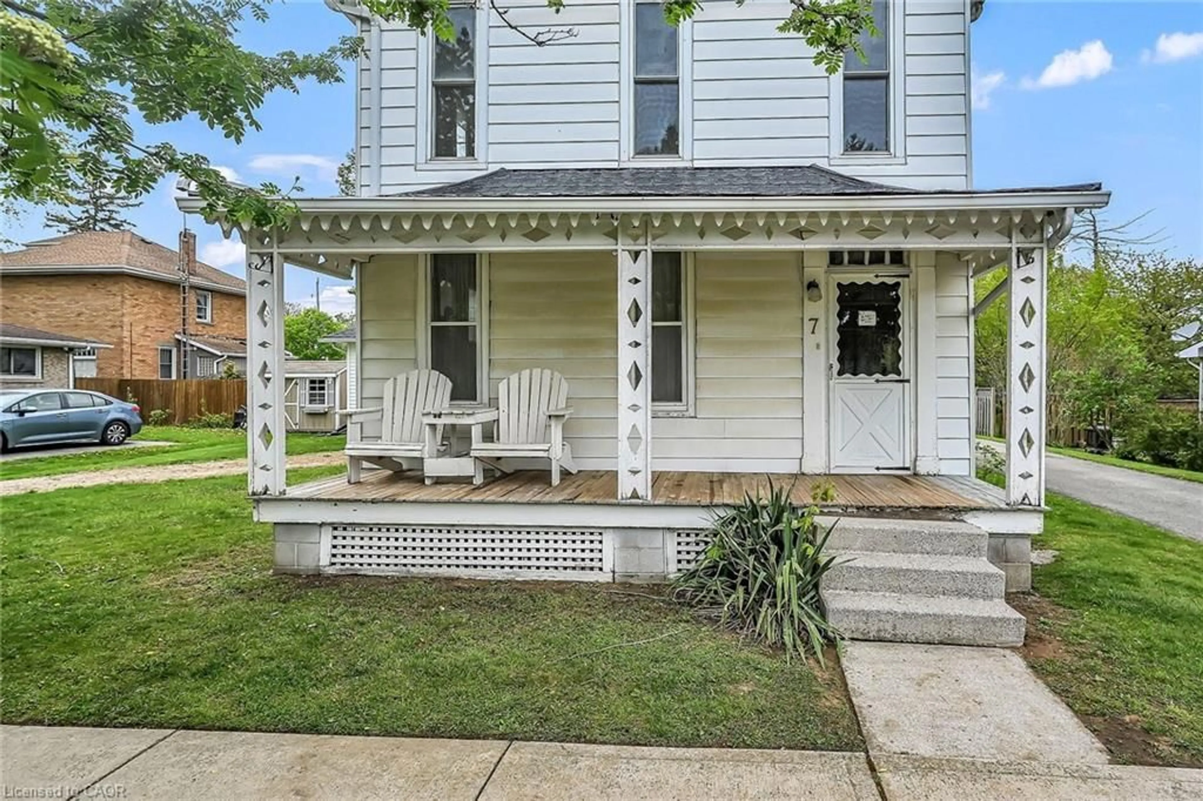 Home with vinyl exterior material, street for 7 Greenock St, Port Dover Ontario N0A 1N0
