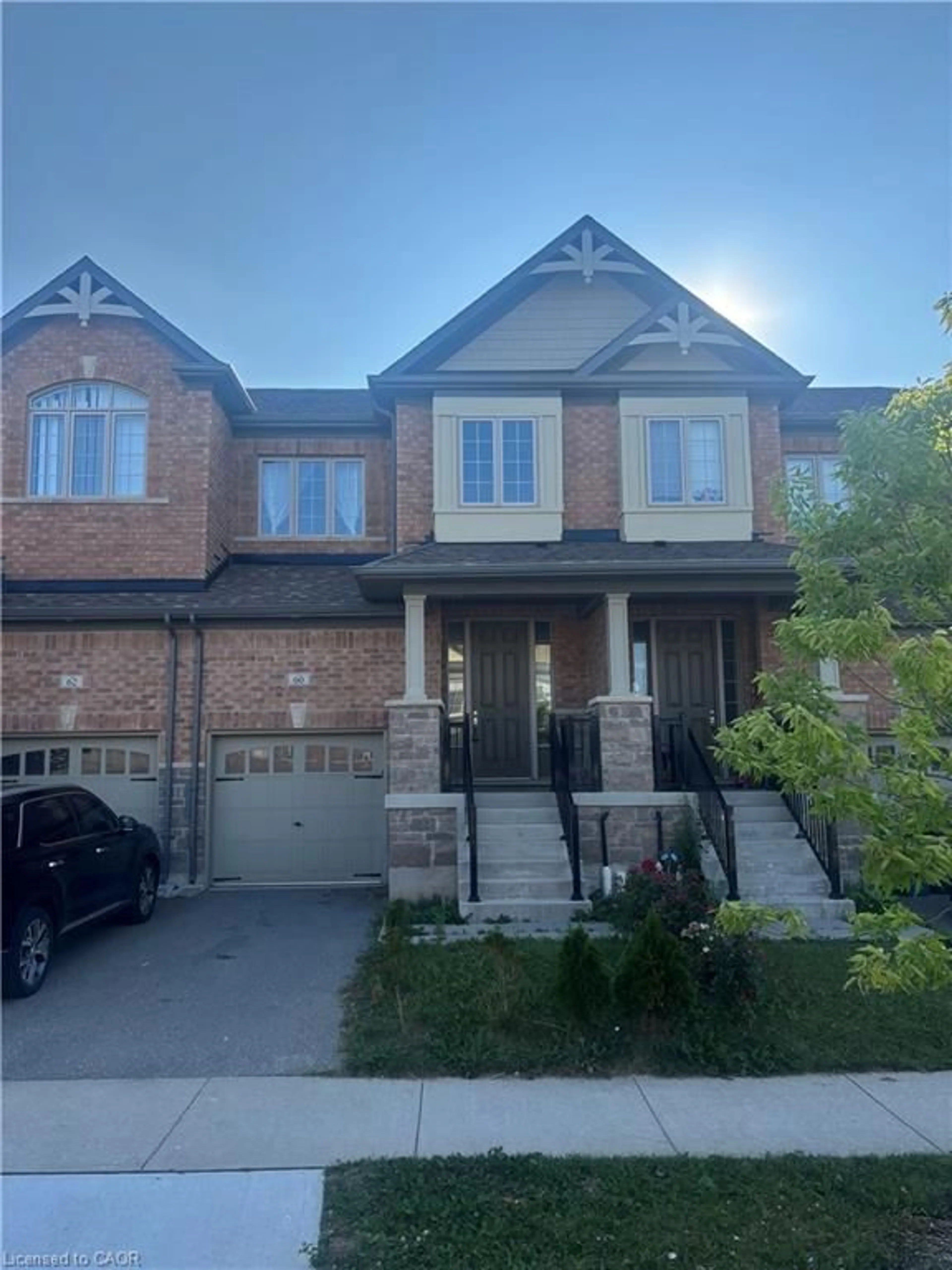 Home with brick exterior material, street for 60 Reistwood Dr, Kitchener Ontario N2P 2L1