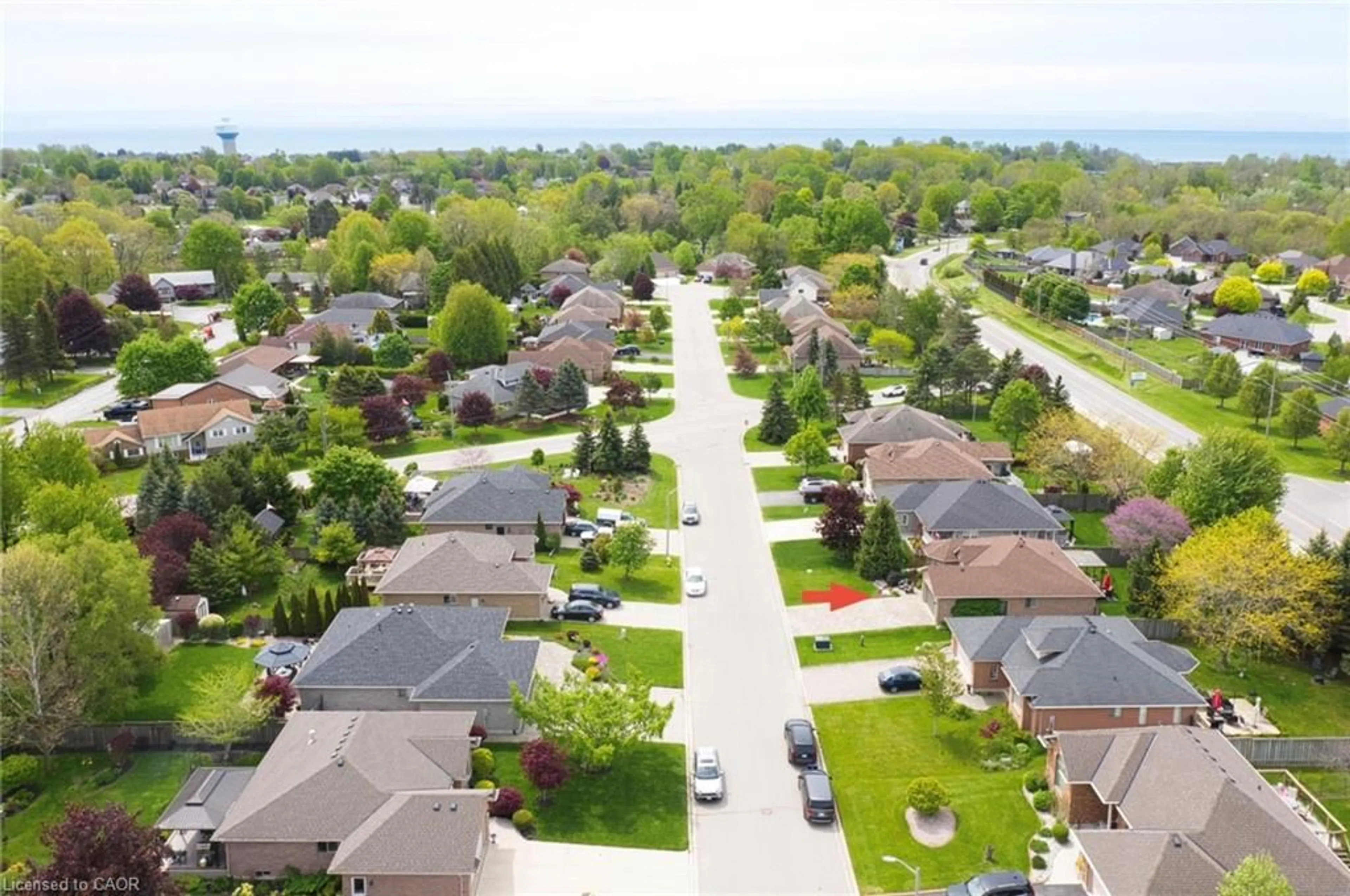 A pic from outside/outdoor area/front of a property/back of a property/a pic from drone, street for 7 Spruce Grove Crt, Port Dover Ontario N0A 1N6