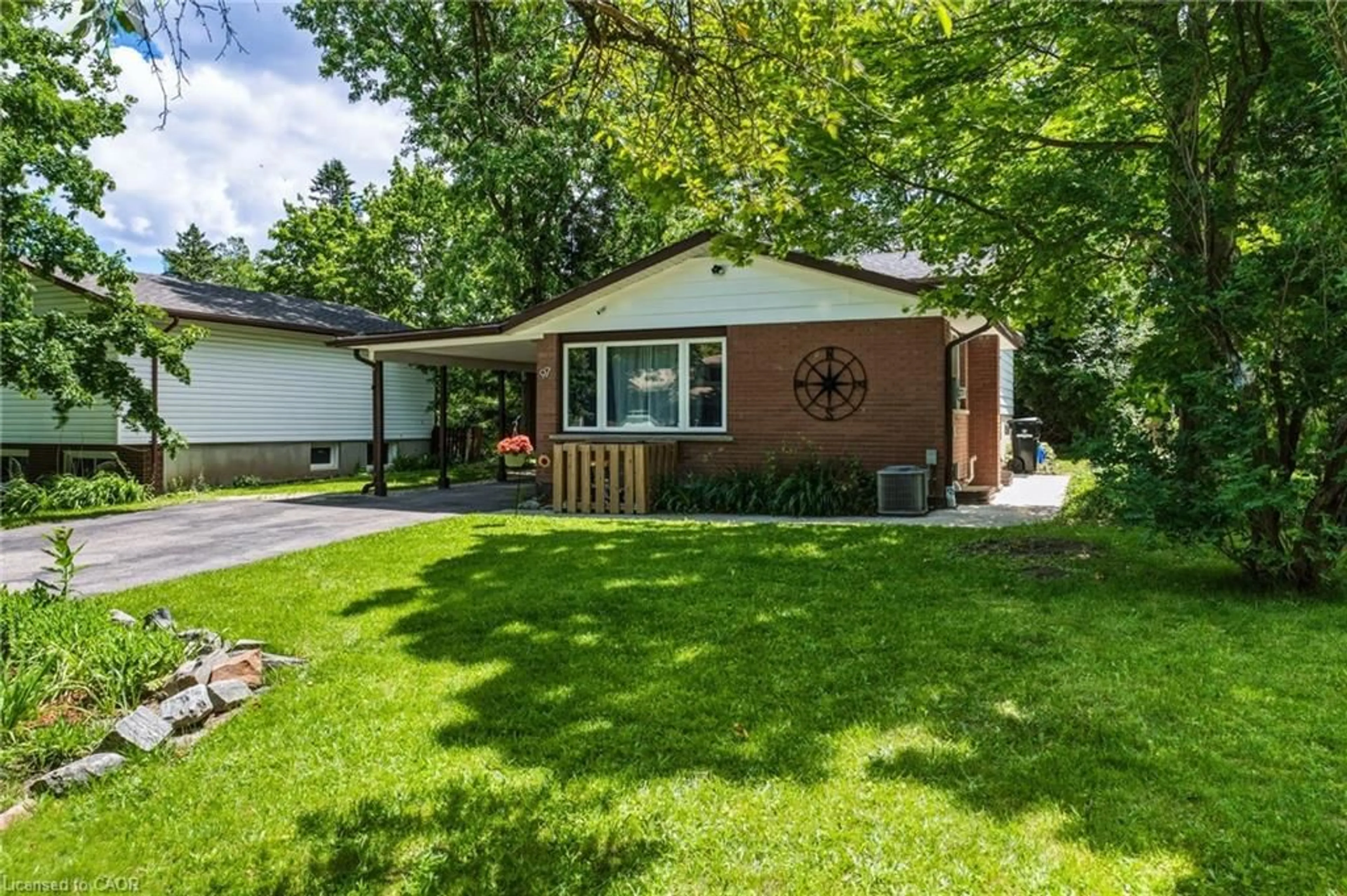 Home with vinyl exterior material, street for 97 Blythwood Rd, Waterloo Ontario N2L 4A1