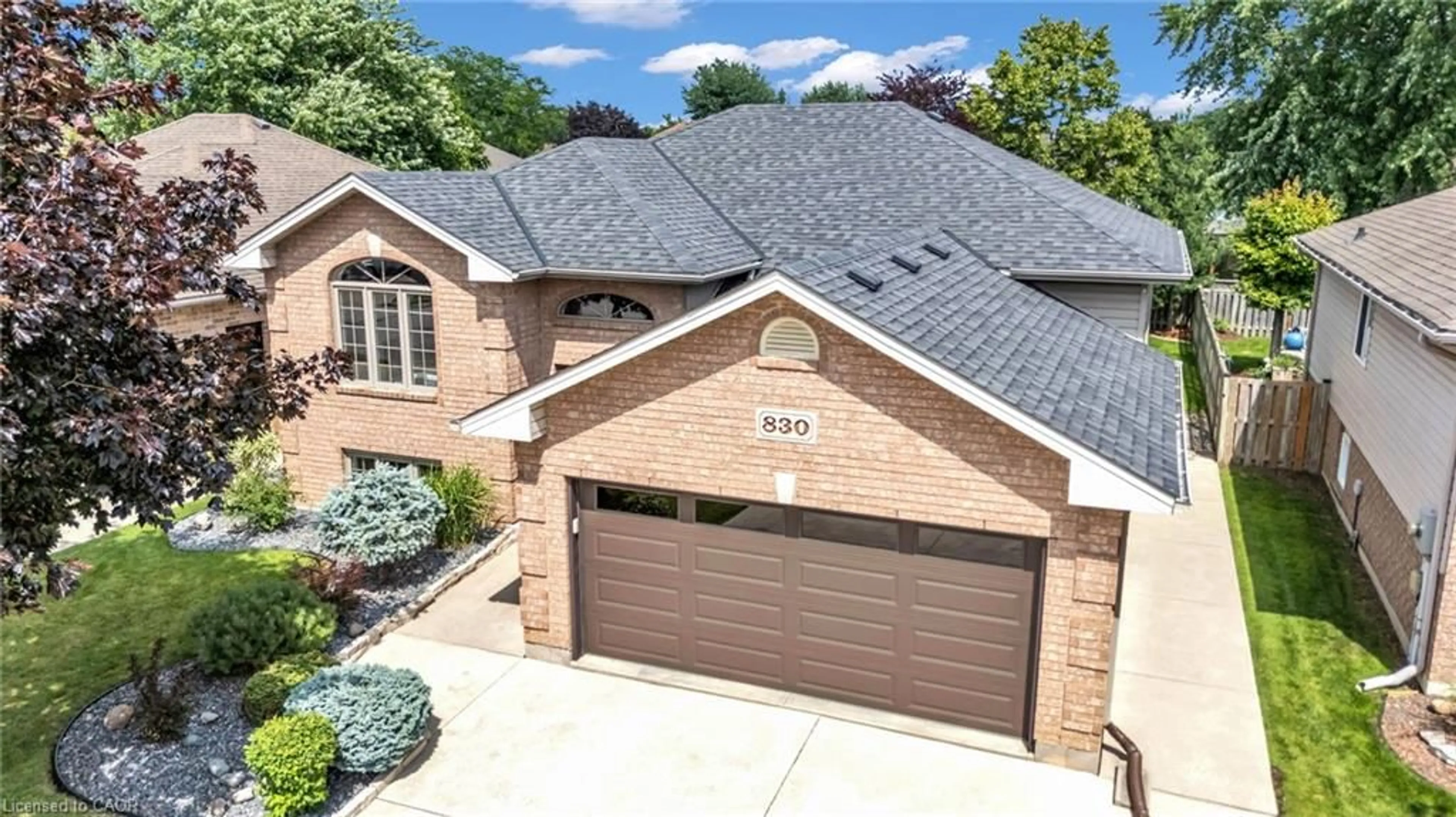 Home with brick exterior material, street for 830 Revland Dr, Tecumseh Ontario N8N 5B2