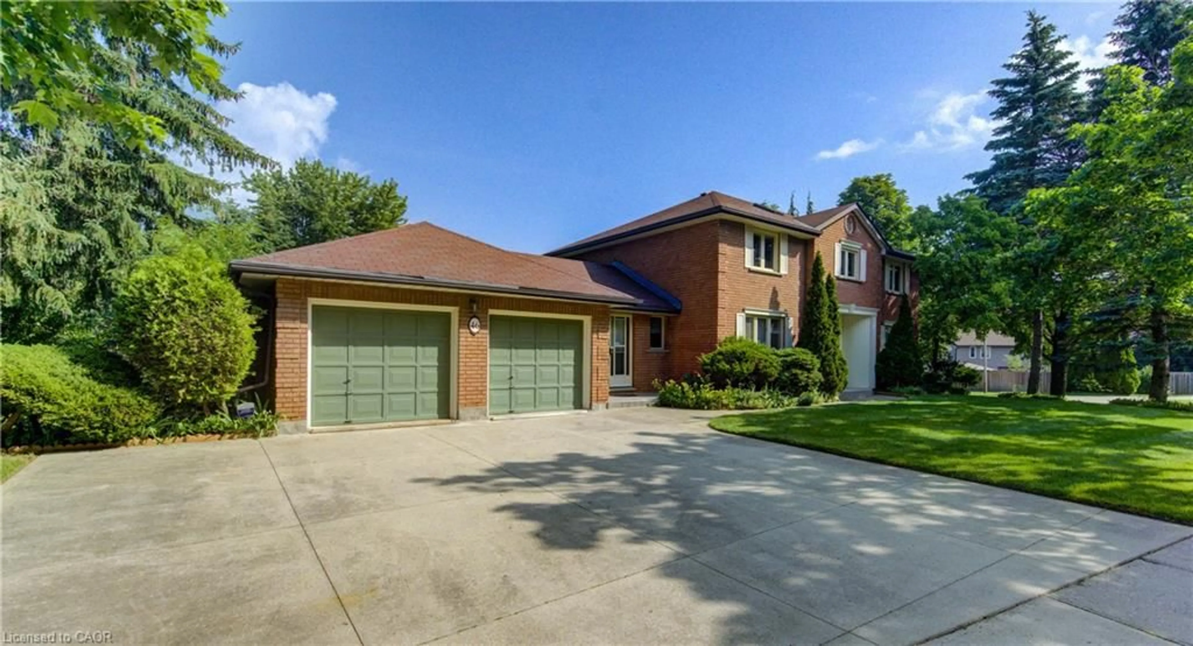 Home with brick exterior material, street for 46 Huntingdale Dr, Kitchener Ontario N2A 3K6