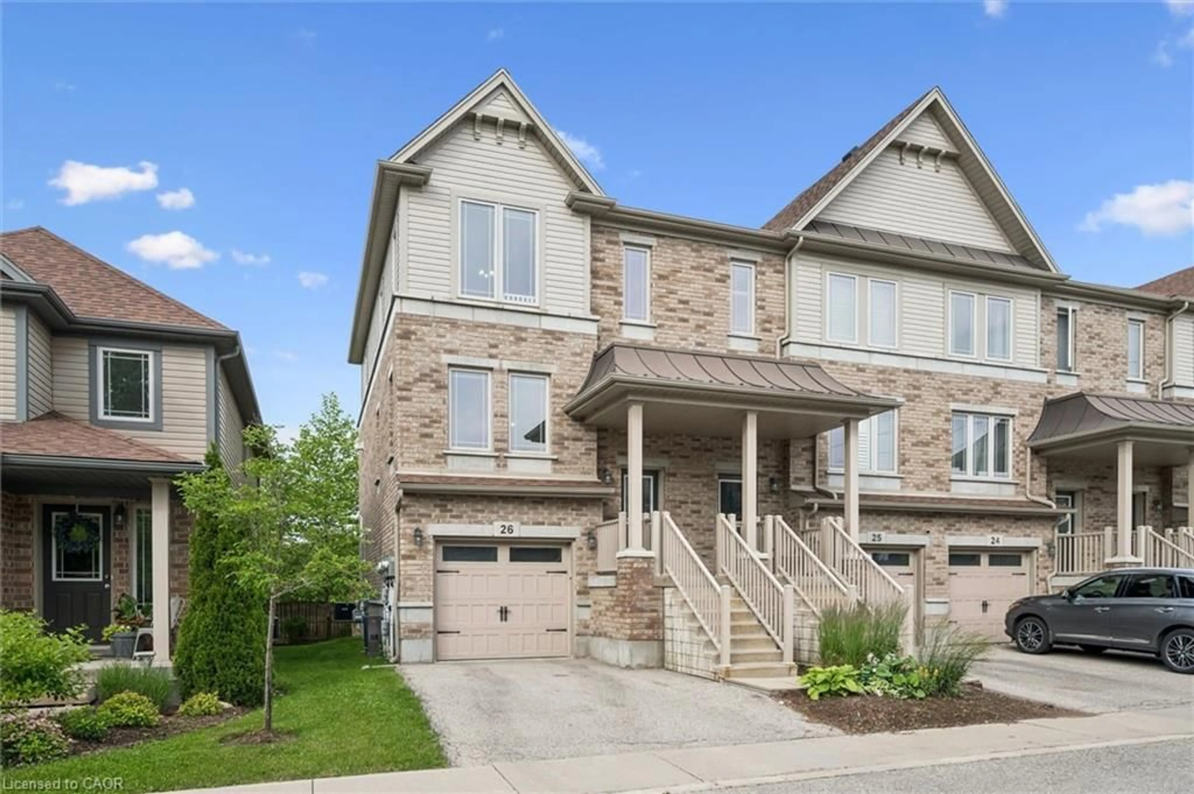 Home with brick exterior material, street for 66 Eastview Rd #26, Guelph Ontario N1E 0N1