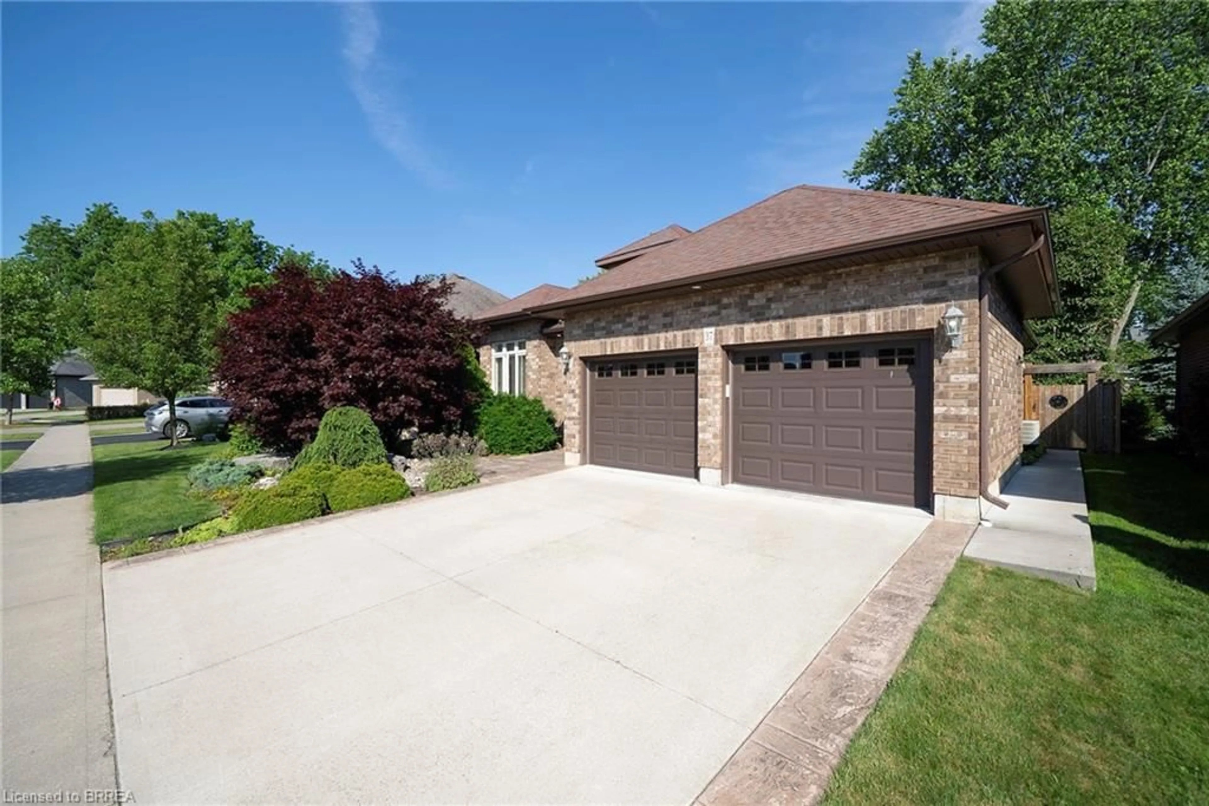 Home with brick exterior material, street for 37 Mulberry Lane, Port Dover Ontario N0A 1N6