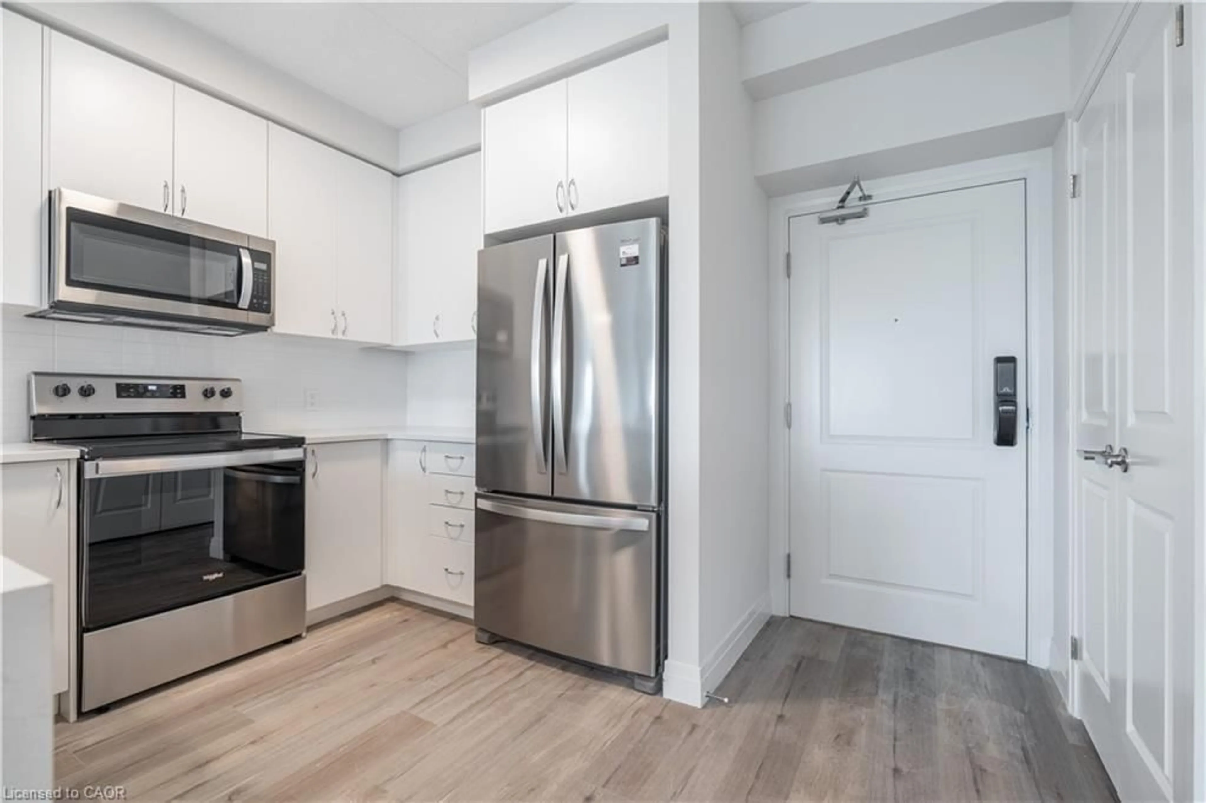 Standard kitchen, wood/laminate floor for 6415 Regional Road 25 #307, Milton Ontario L9T 9M9