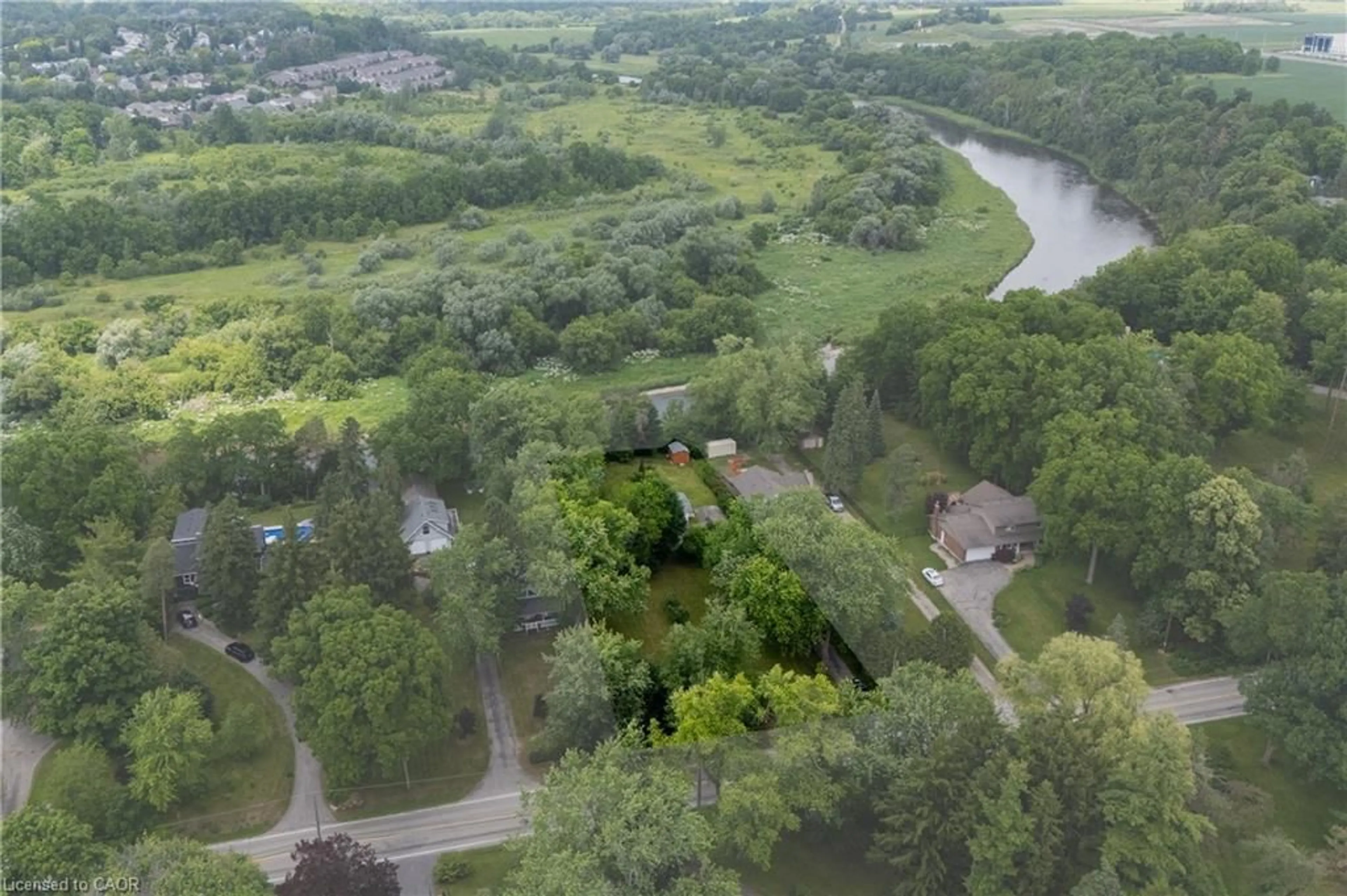 A pic from outside/outdoor area/front of a property/back of a property/a pic from drone, water/lake/river/ocean view for 176 Riverbank Dr, Cambridge Ontario N3H 4R6