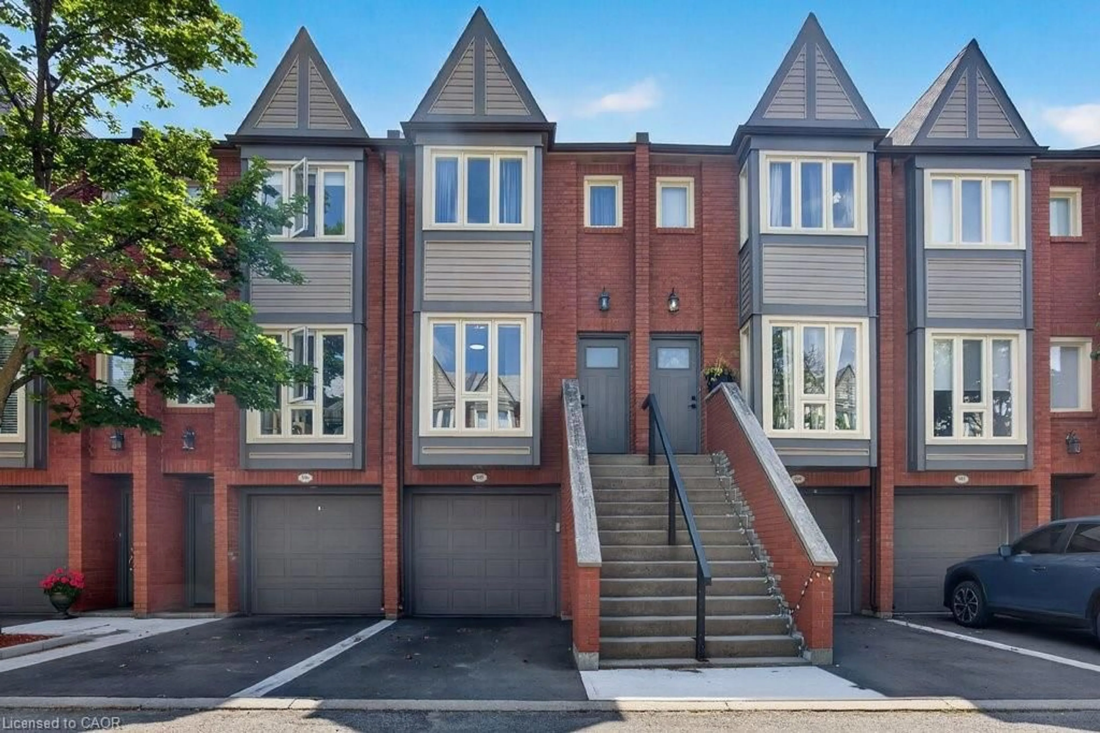 Home with brick exterior material, street for 895 Maple Ave #105, Burlington Ontario L7S 2H7