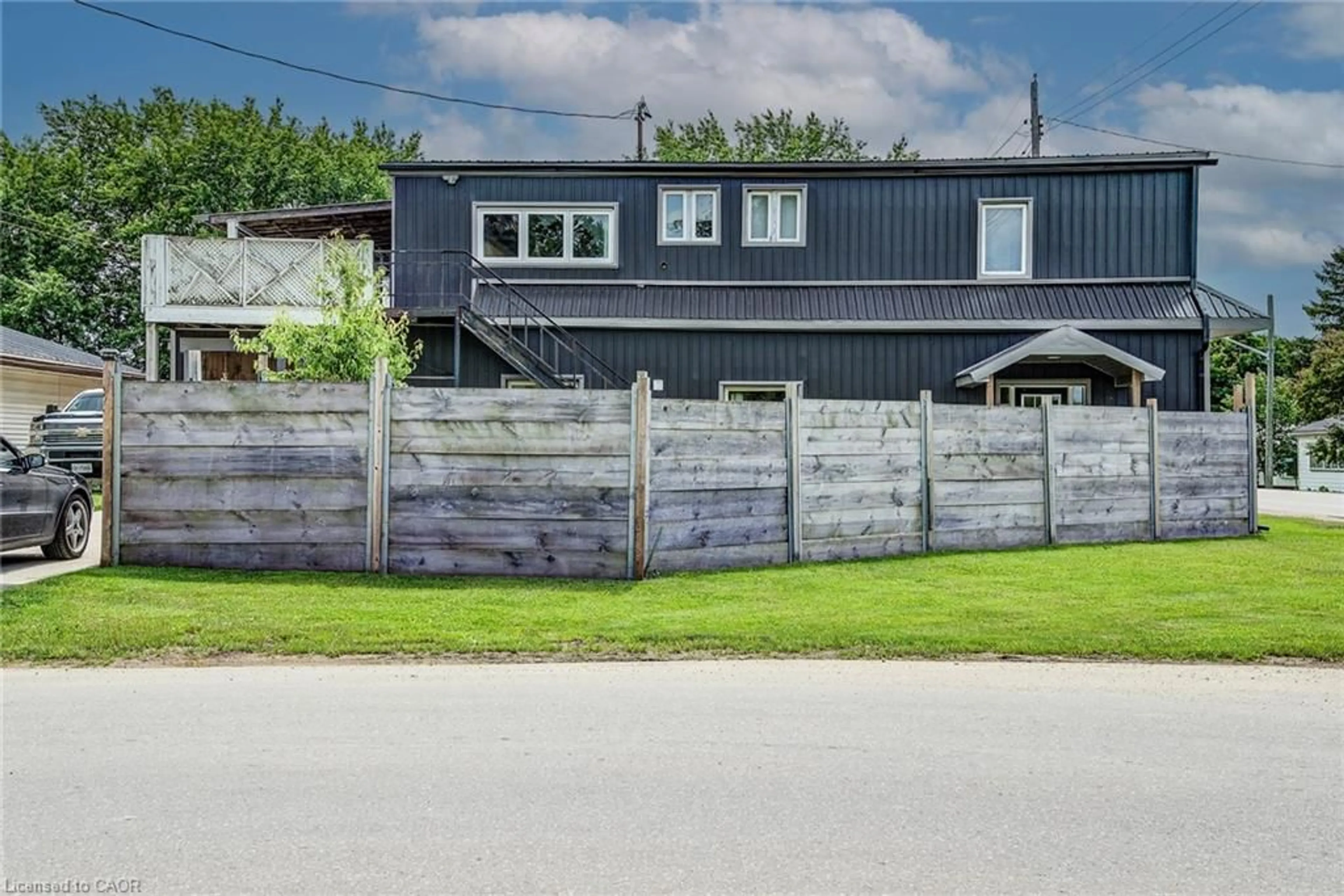 A pic from outside/outdoor area/front of a property/back of a property/a pic from drone, street for 6409 Perth Road 121 Rd, Poole Ontario N0K 1S0