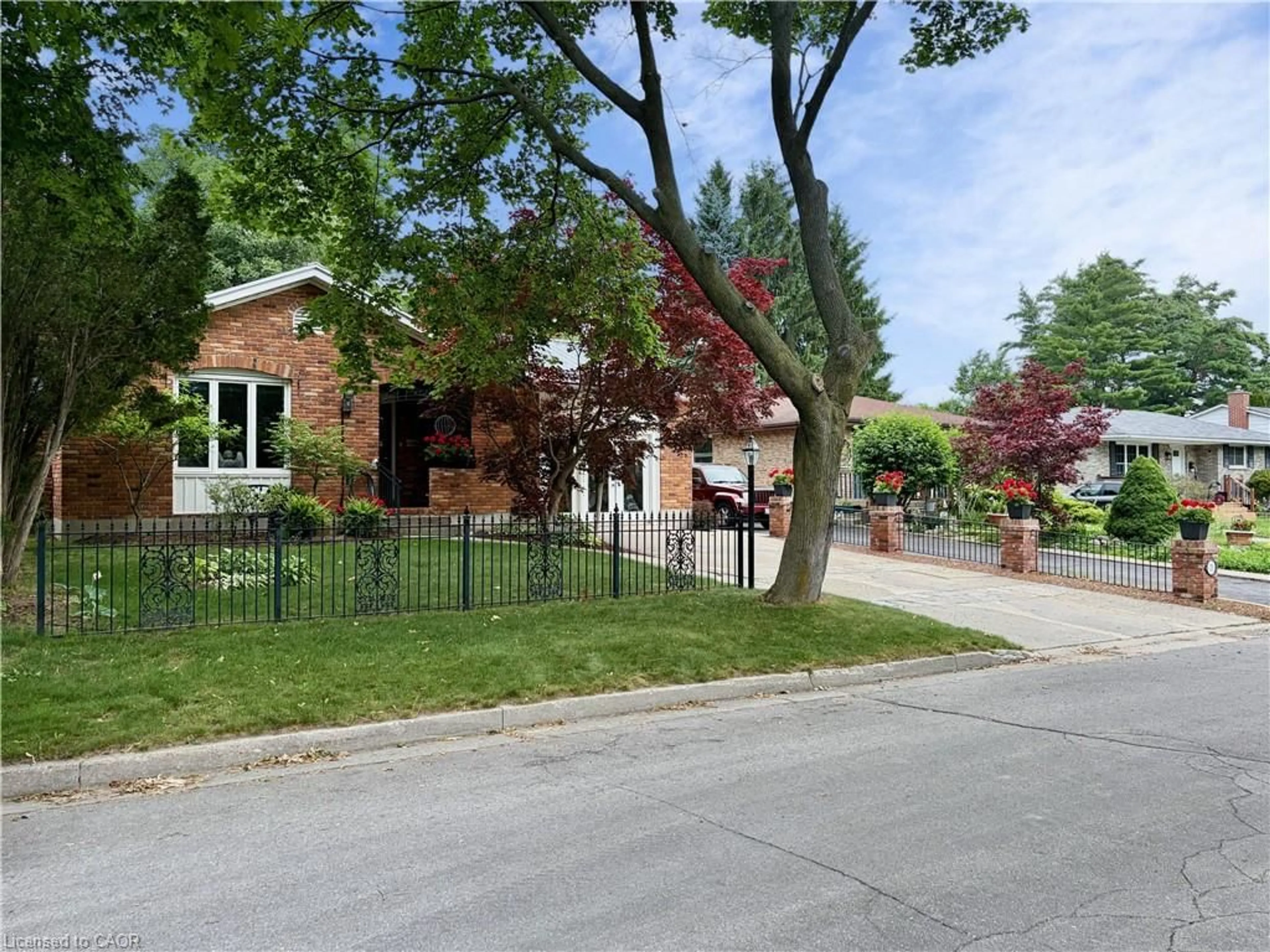 Home with brick exterior material, street for 13 Kelly Ave, Simcoe Ontario N3Y 4V6