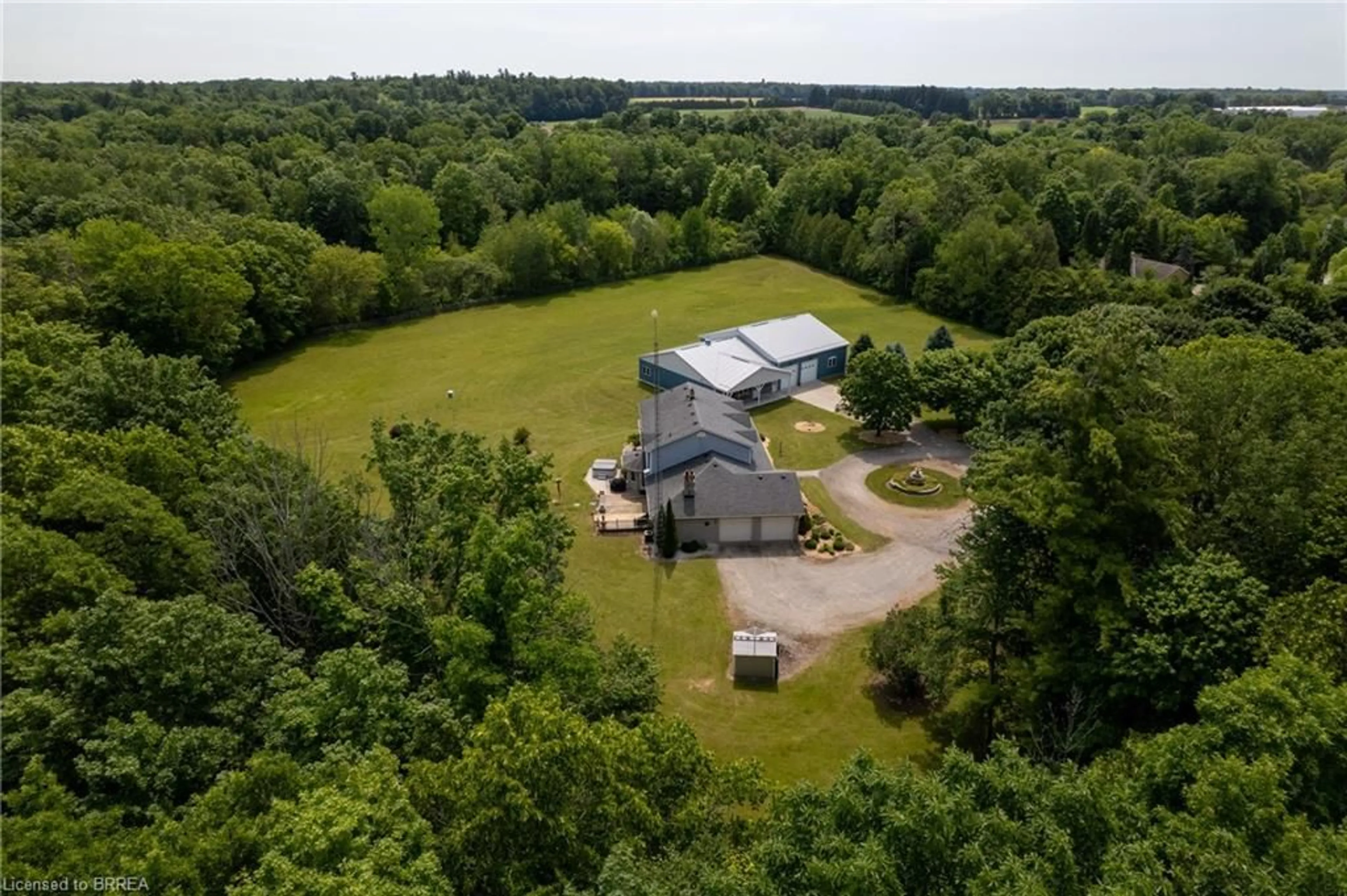 A pic from outside/outdoor area/front of a property/back of a property/a pic from drone, unknown for 1632 Windham Road 19, Norfolk Ontario N0E 1H0