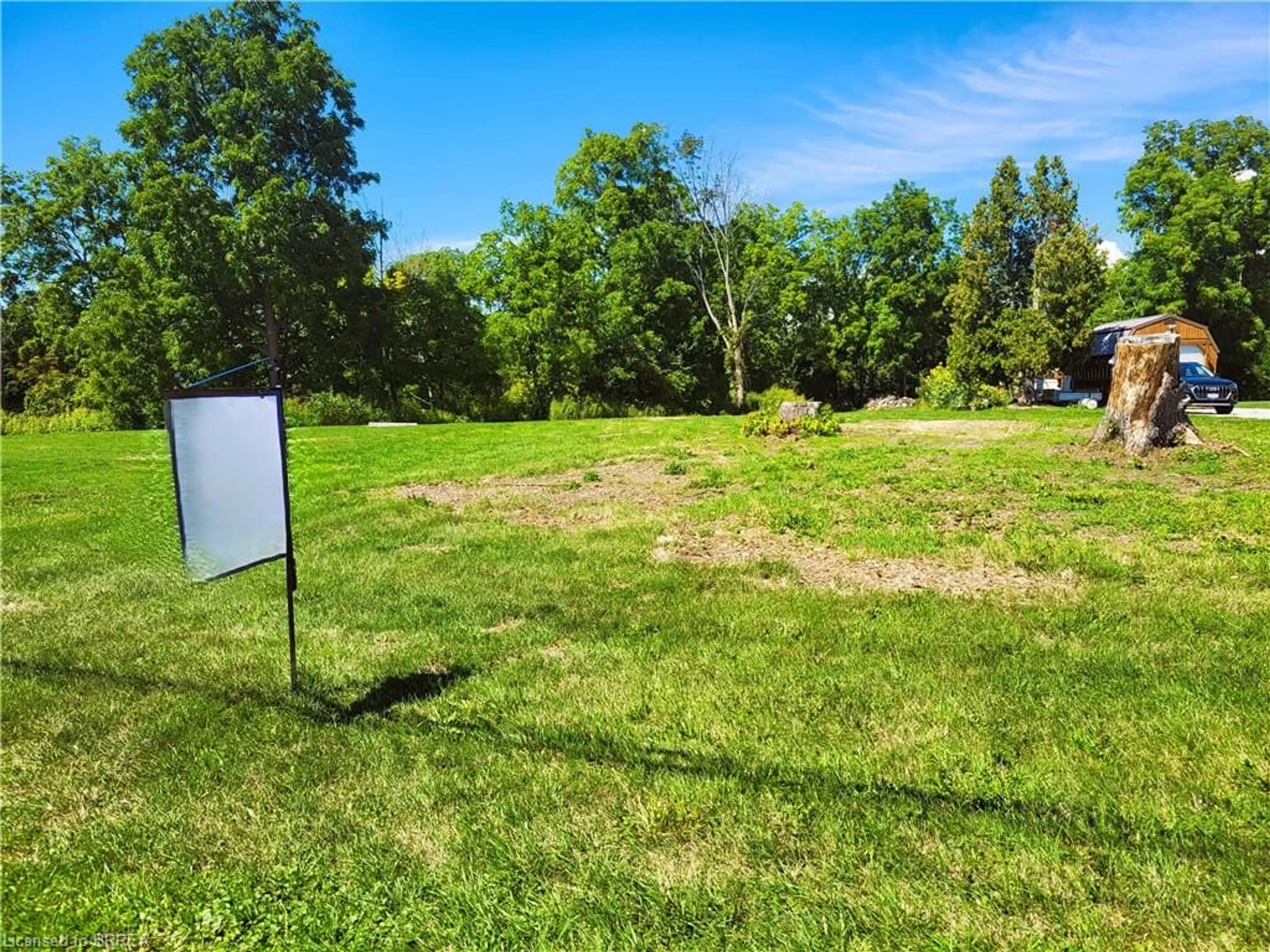 A pic from outside/outdoor area/front of a property/back of a property/a pic from drone, forest/trees view for 75 Wolven St, Port Rowan Ontario N0E 1M0