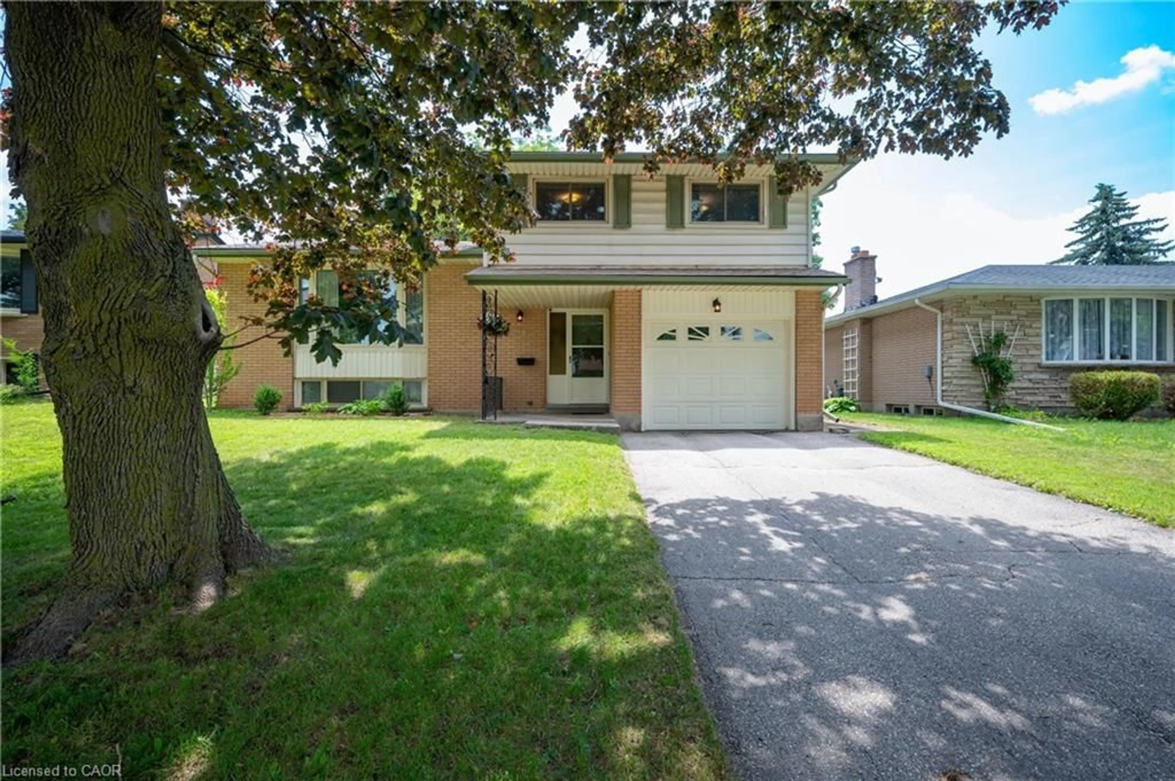 Home with brick exterior material, street for 99 Lorraine Ave, Kitchener Ontario N2B 2N1