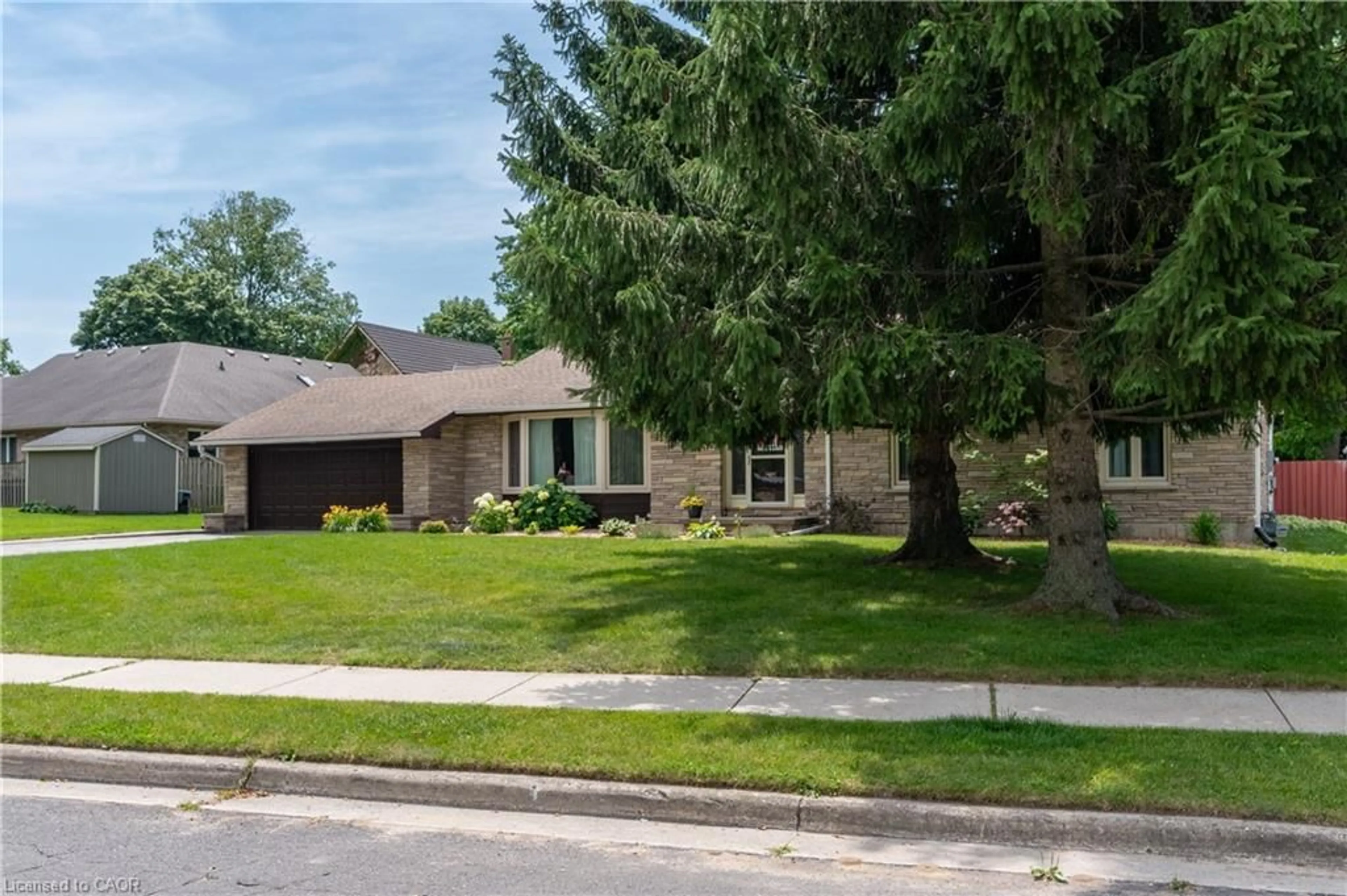 Home with brick exterior material, street for 74 Pine St, Aylmer Ontario N5H 1P3