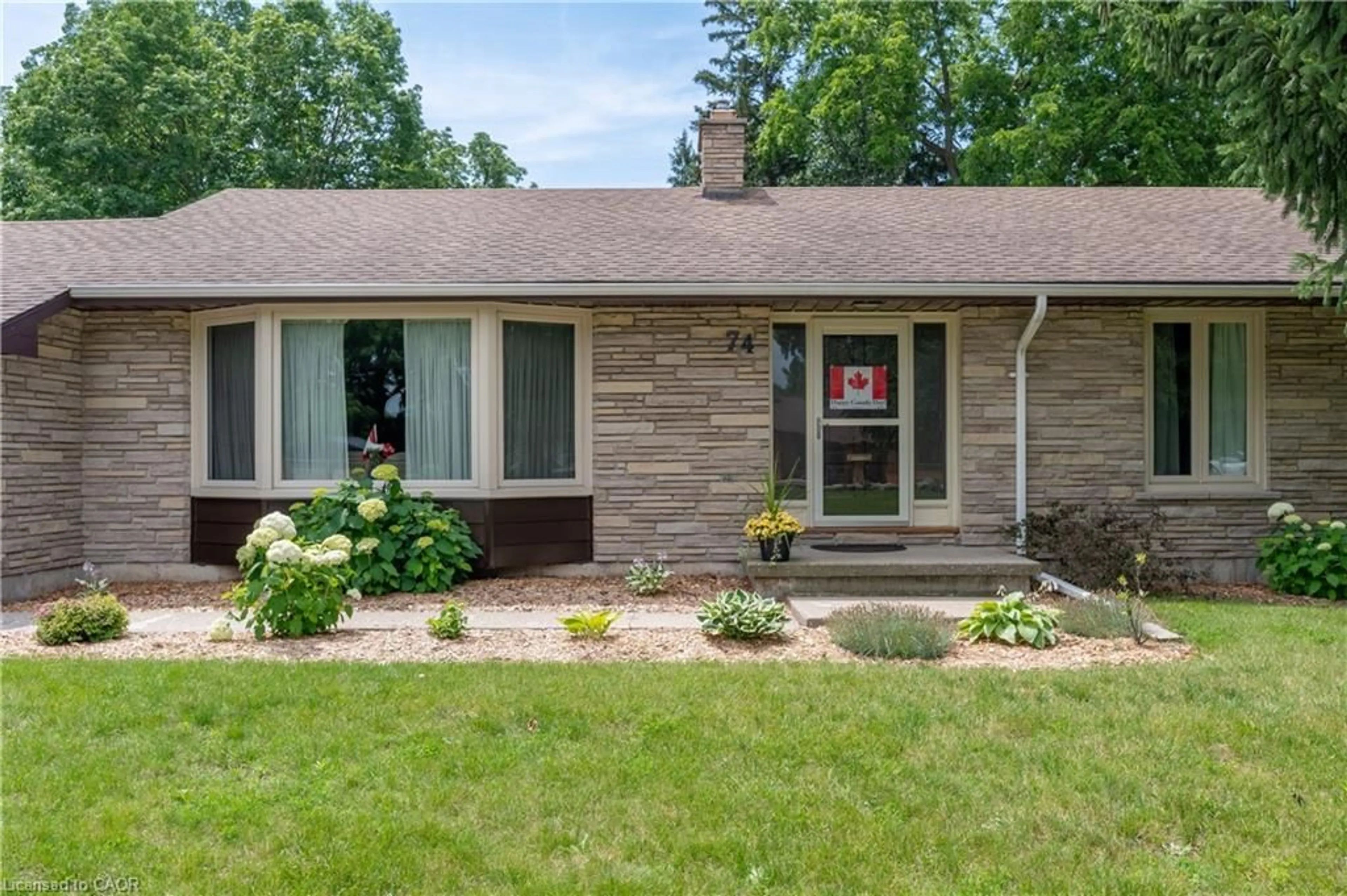 Home with brick exterior material, street for 74 Pine St, Aylmer Ontario N5H 1P3