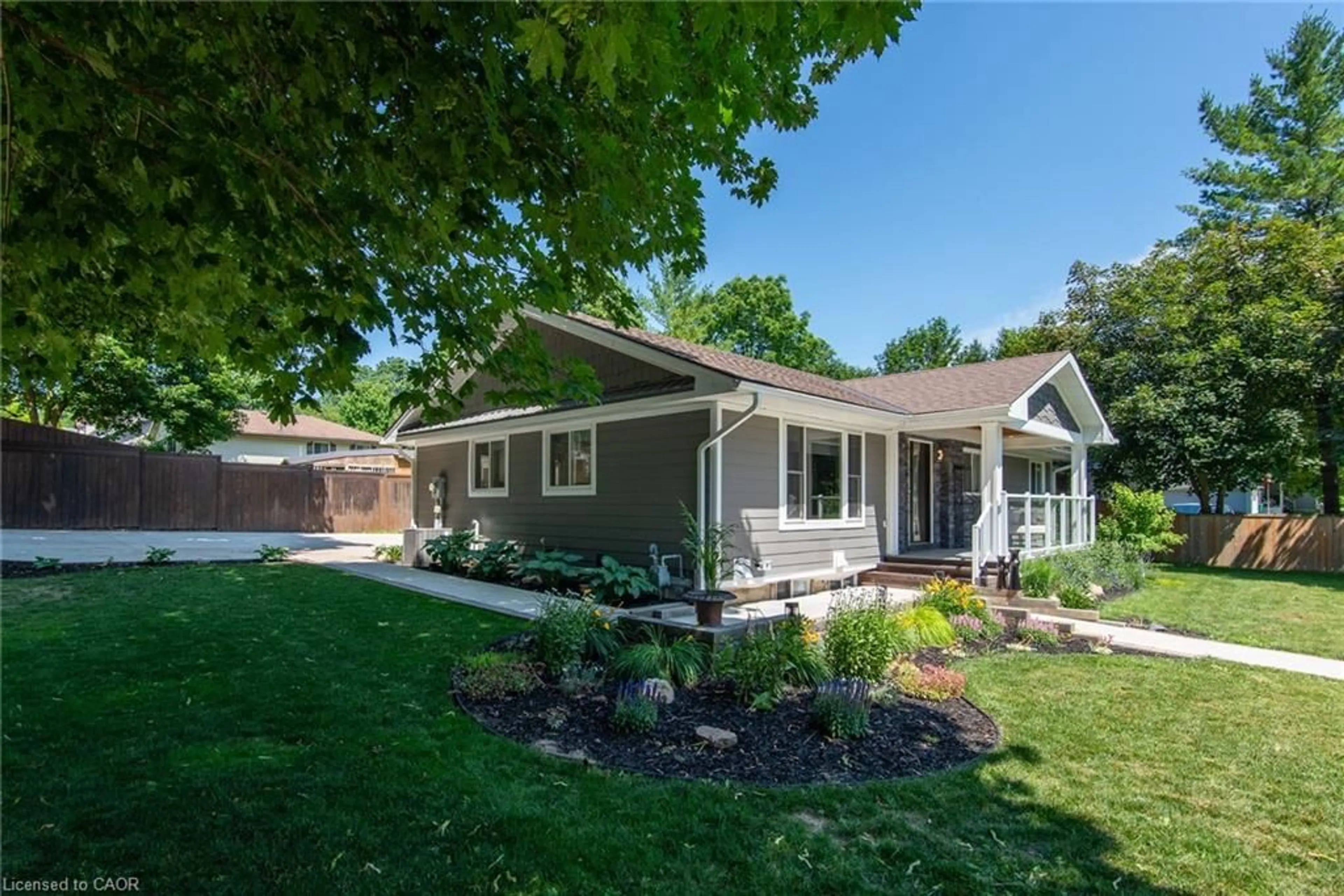 Home with vinyl exterior material, street for 99 John St, Wingham Ontario N0G 2W0