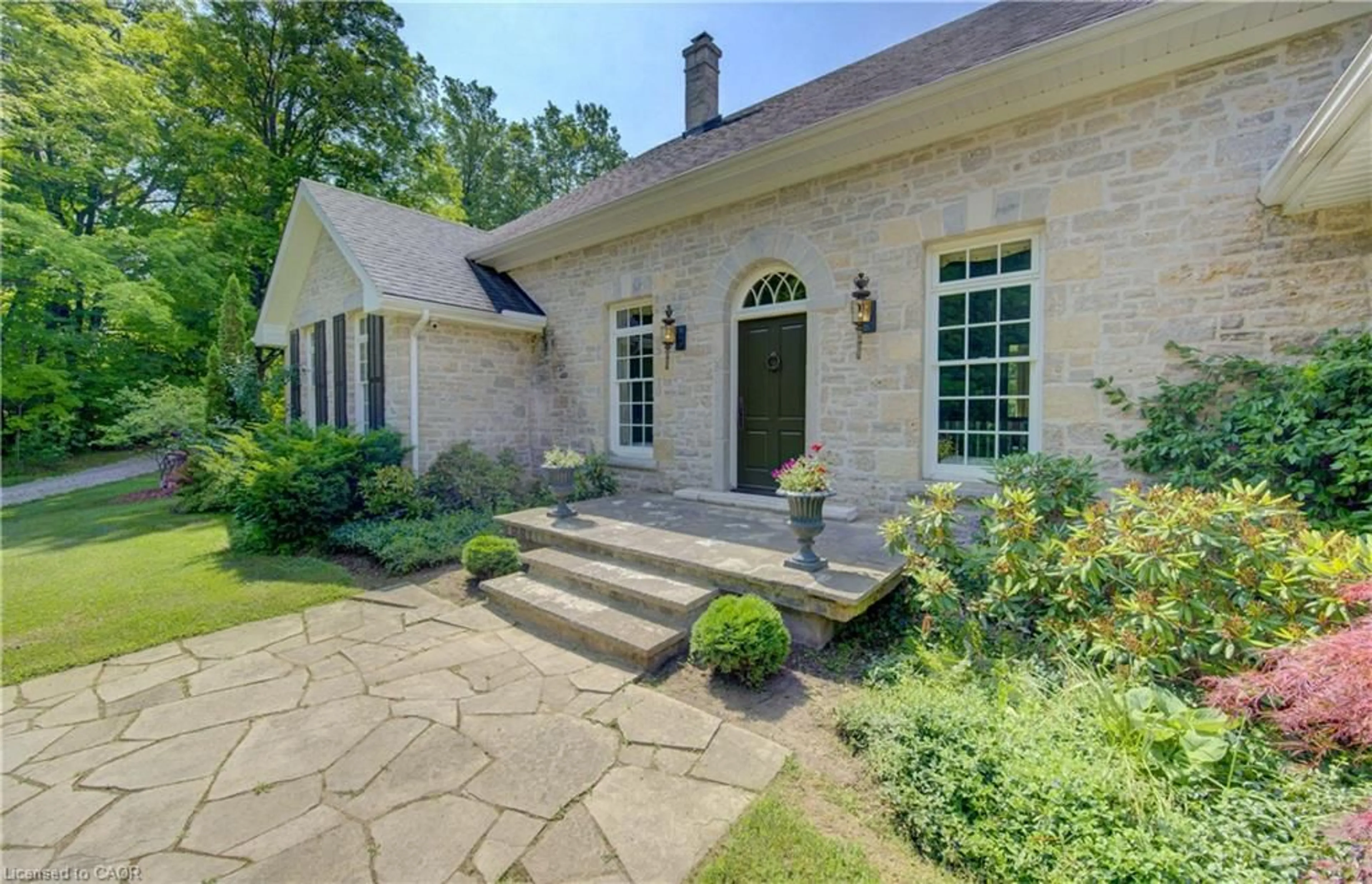 Home with brick exterior material, street for 7785 Wellington Road 34, Wellington Ontario N0B 2J0