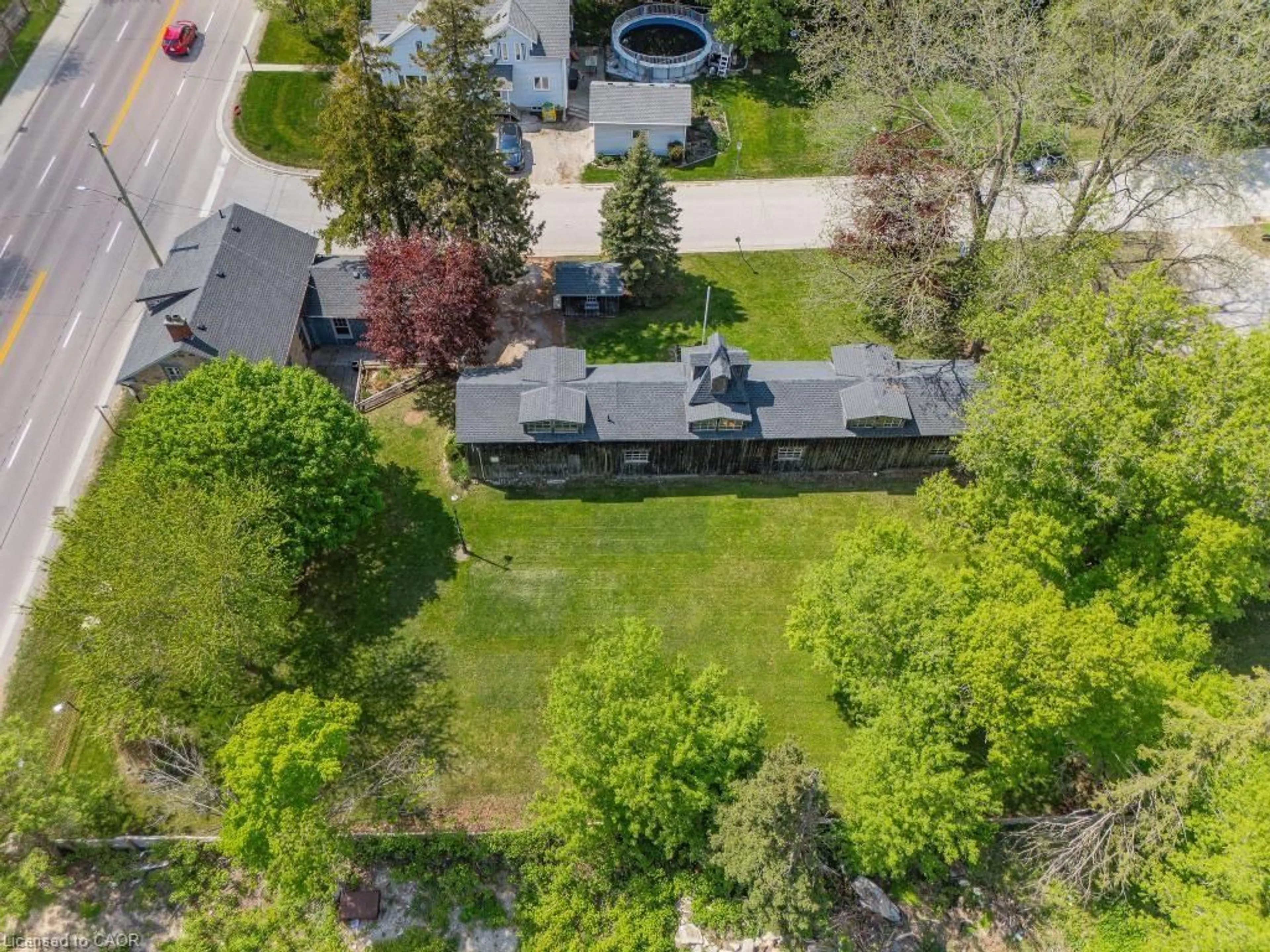 A pic from outside/outdoor area/front of a property/back of a property/a pic from drone, street for 52 Brock Rd, Puslinch Ontario N0B 2J0