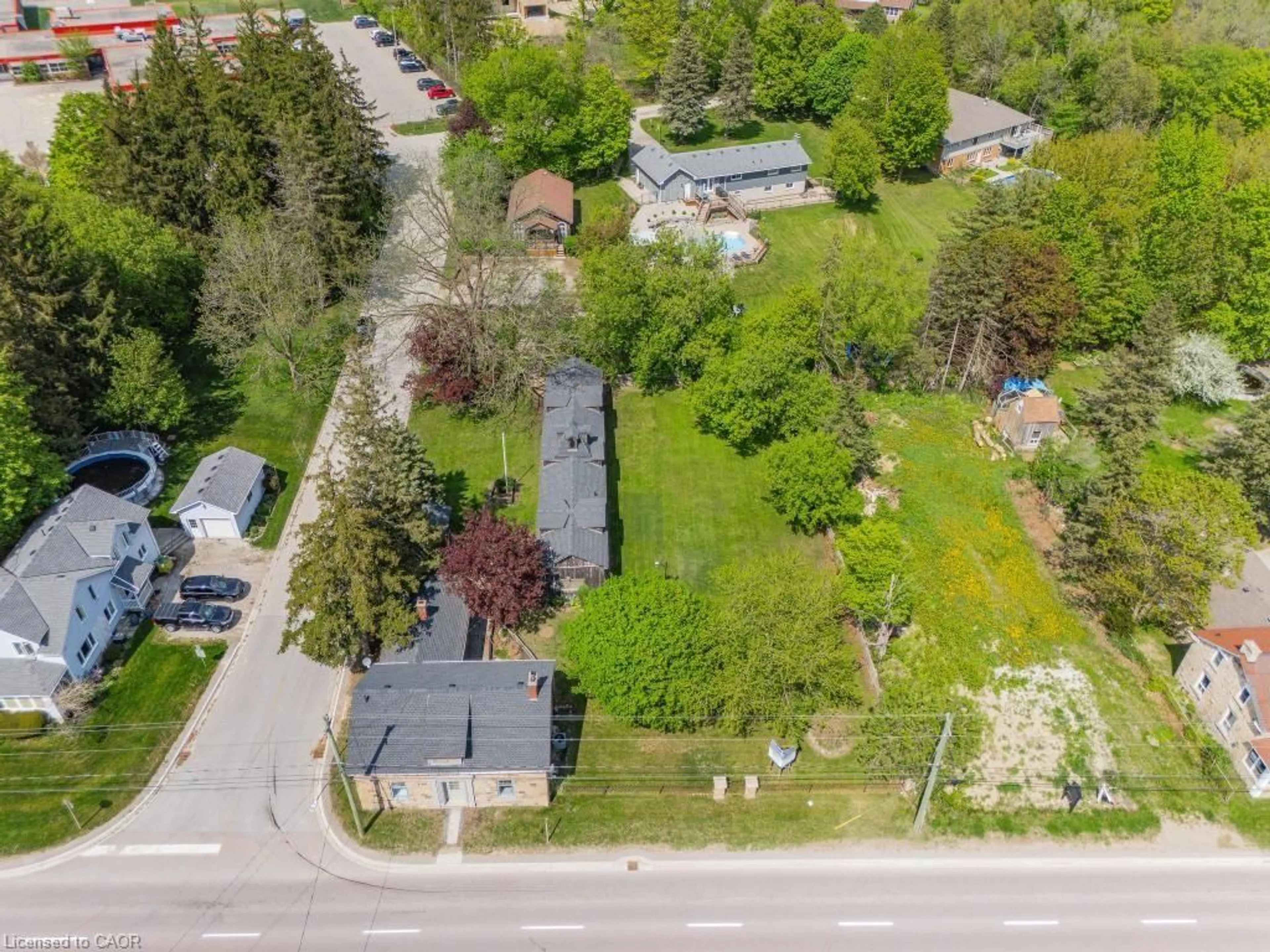 A pic from outside/outdoor area/front of a property/back of a property/a pic from drone, street for 52 Brock Rd, Puslinch Ontario N0B 2J0