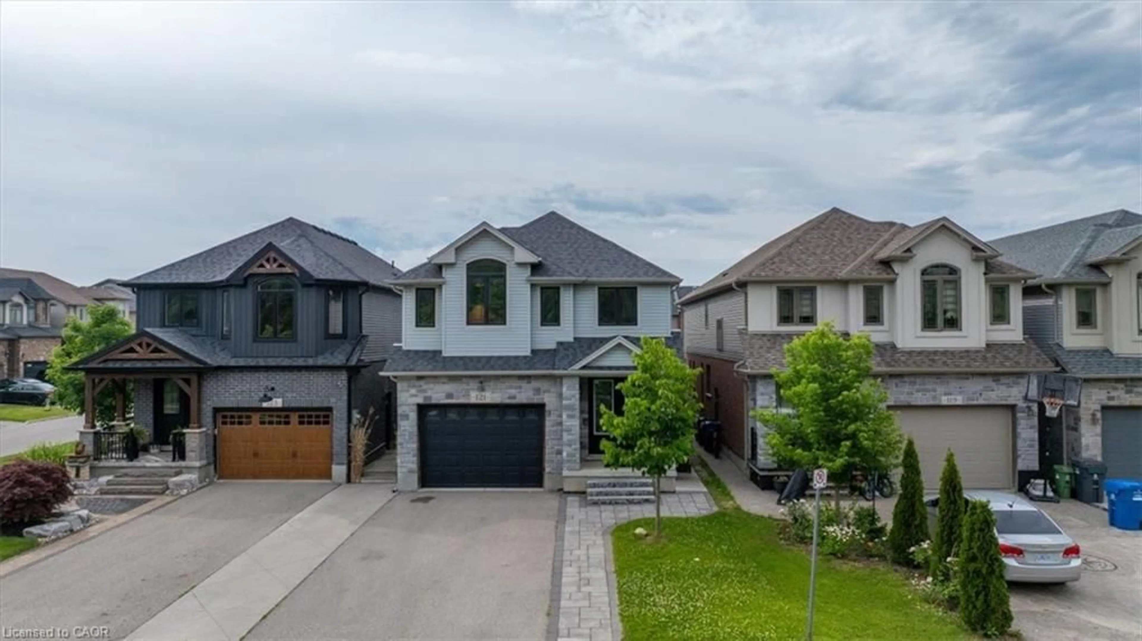 Home with brick exterior material, street for 121 Dallan Dr, Guelph Ontario N1L 0N3