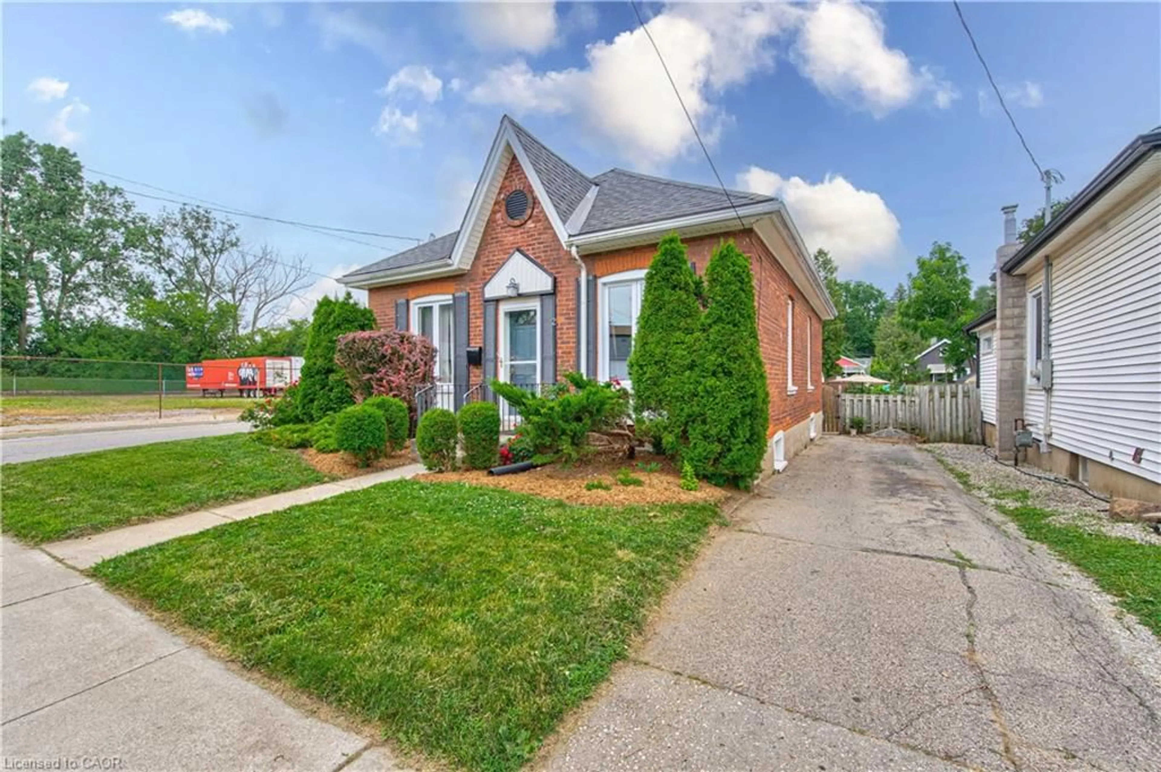 Home with brick exterior material, street for 2 Brunswick St, Brantford Ontario N3T 1E7