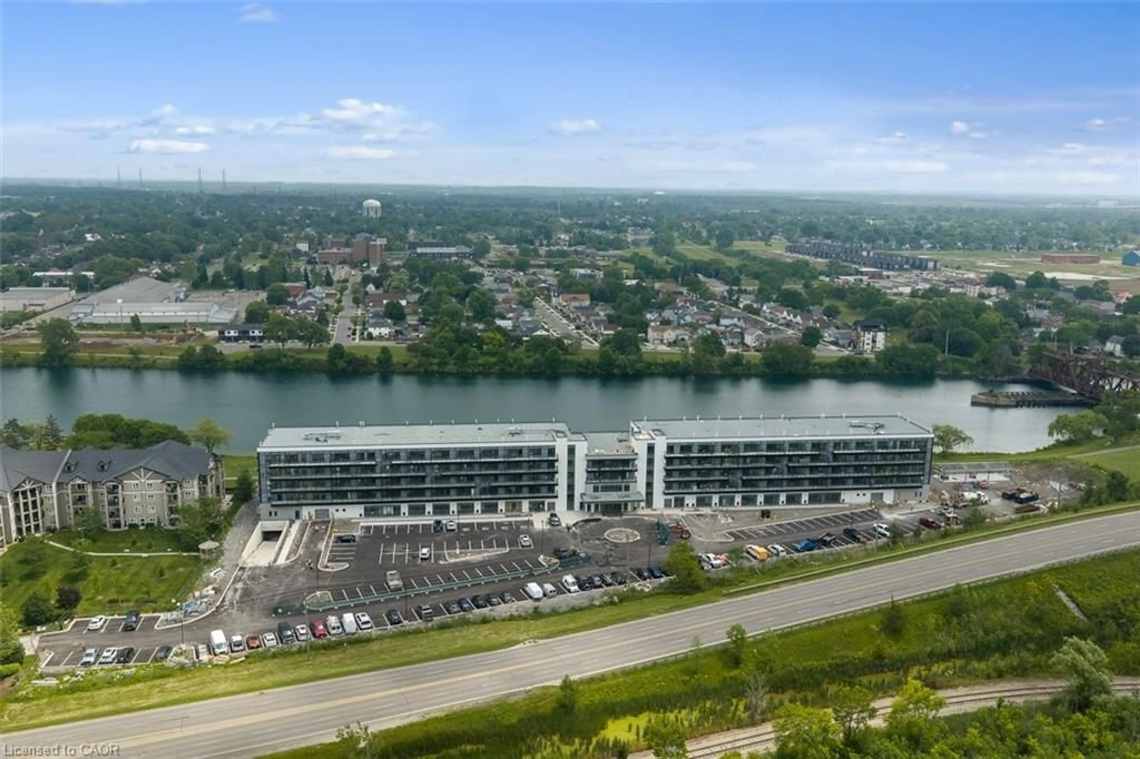 A pic from outside/outdoor area/front of a property/back of a property/a pic from drone, water/lake/river/ocean view for 350 Prince Charles Dr #247, Welland Ontario L3C 7B3