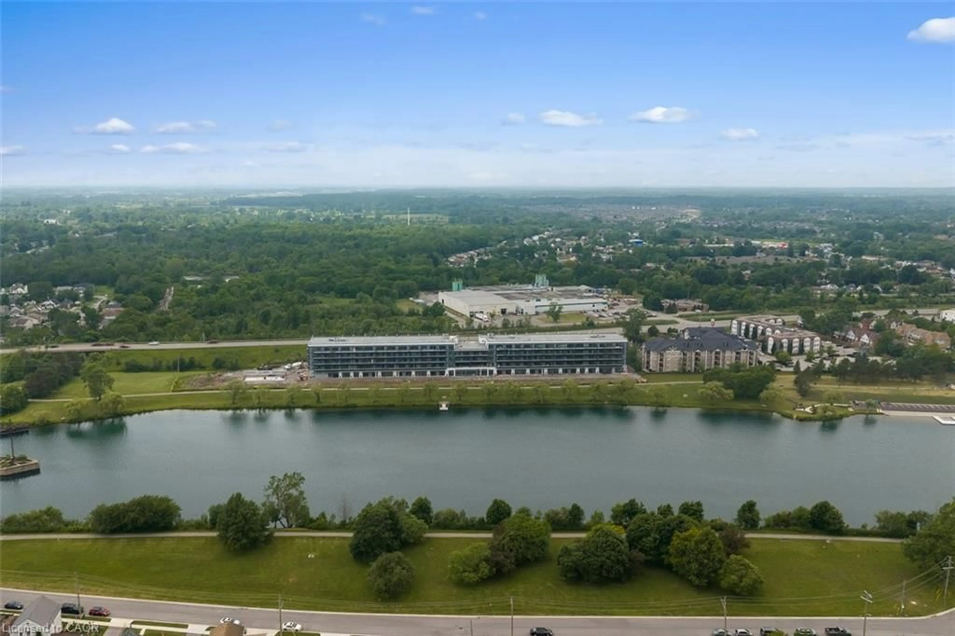 A pic from outside/outdoor area/front of a property/back of a property/a pic from drone, water/lake/river/ocean view for 350 Prince Charles Dr #247, Welland Ontario L3C 7B3