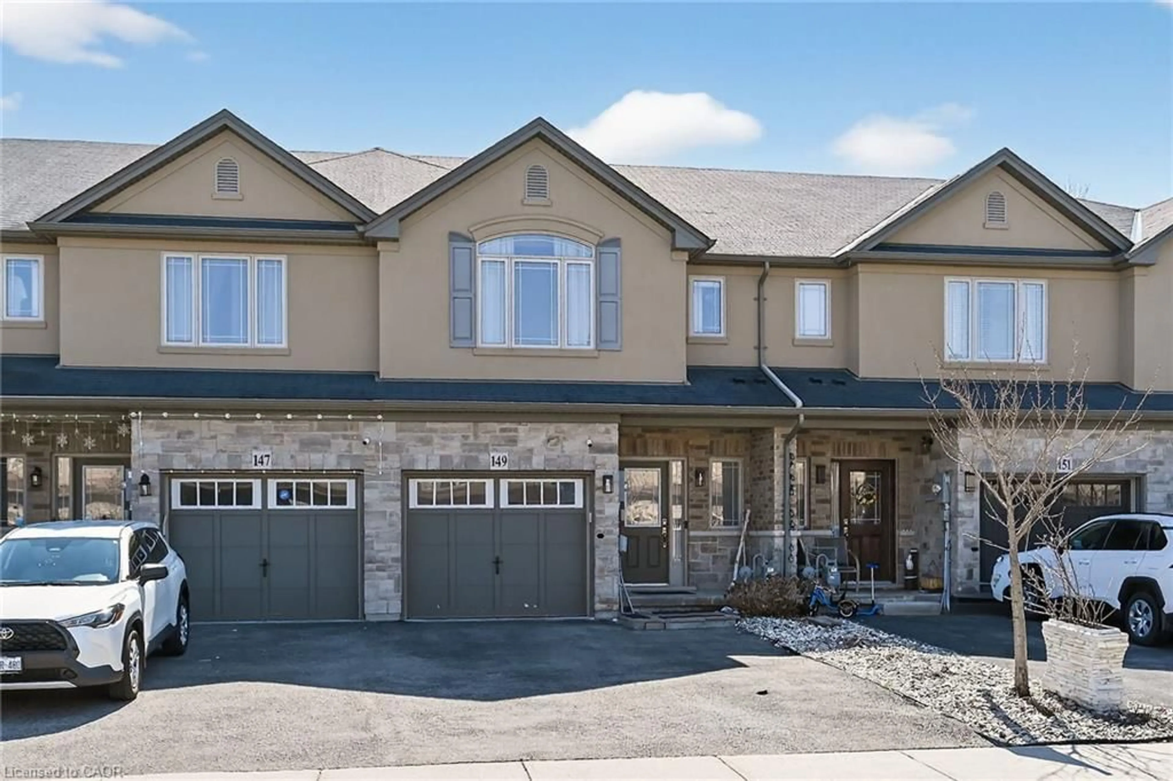 Home with brick exterior material, street for 39 Everton Dr, Guelph Ontario N1E 0R9
